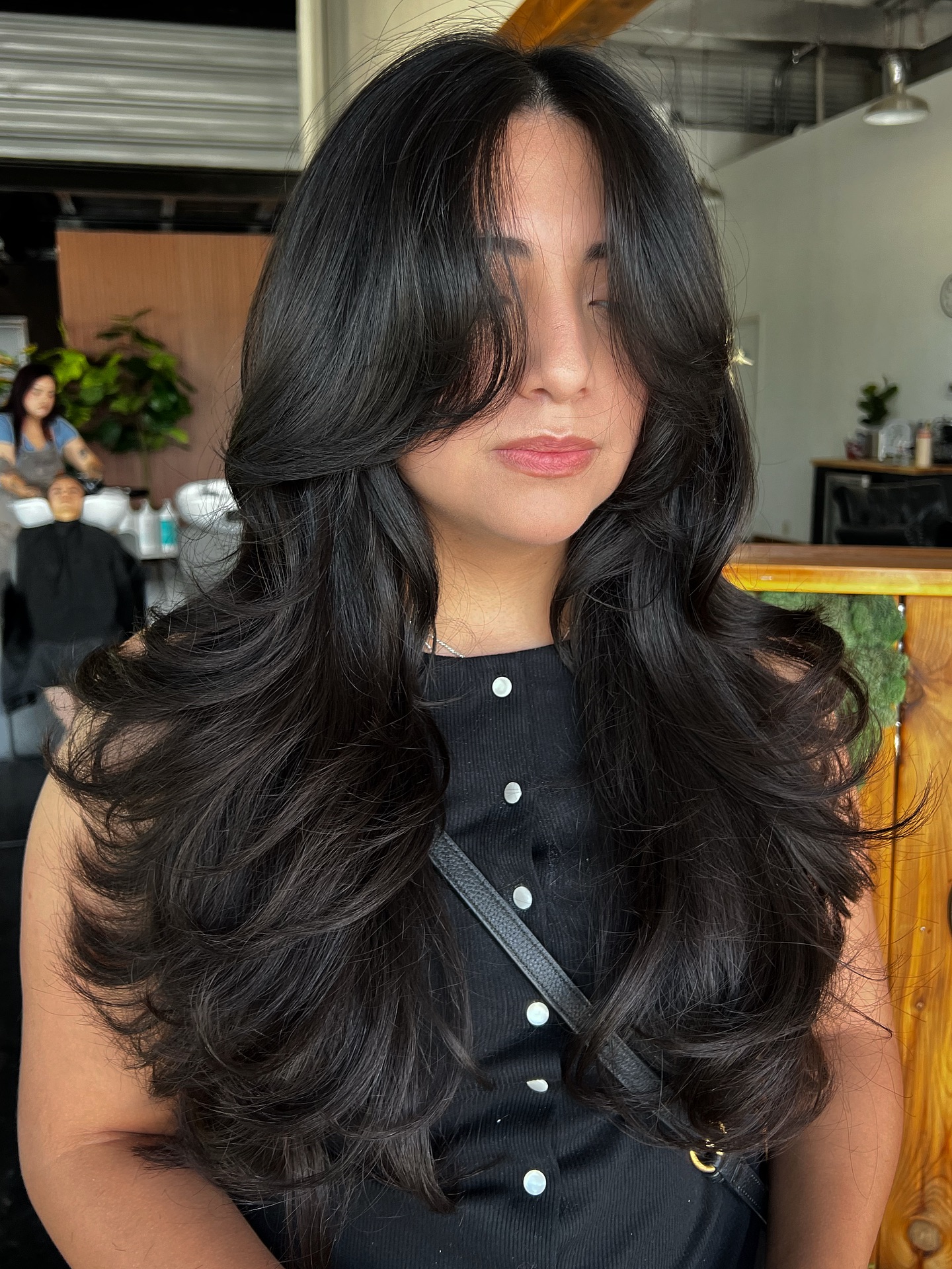 Long Feathered Layers with Face-Framing Curtain Fringe