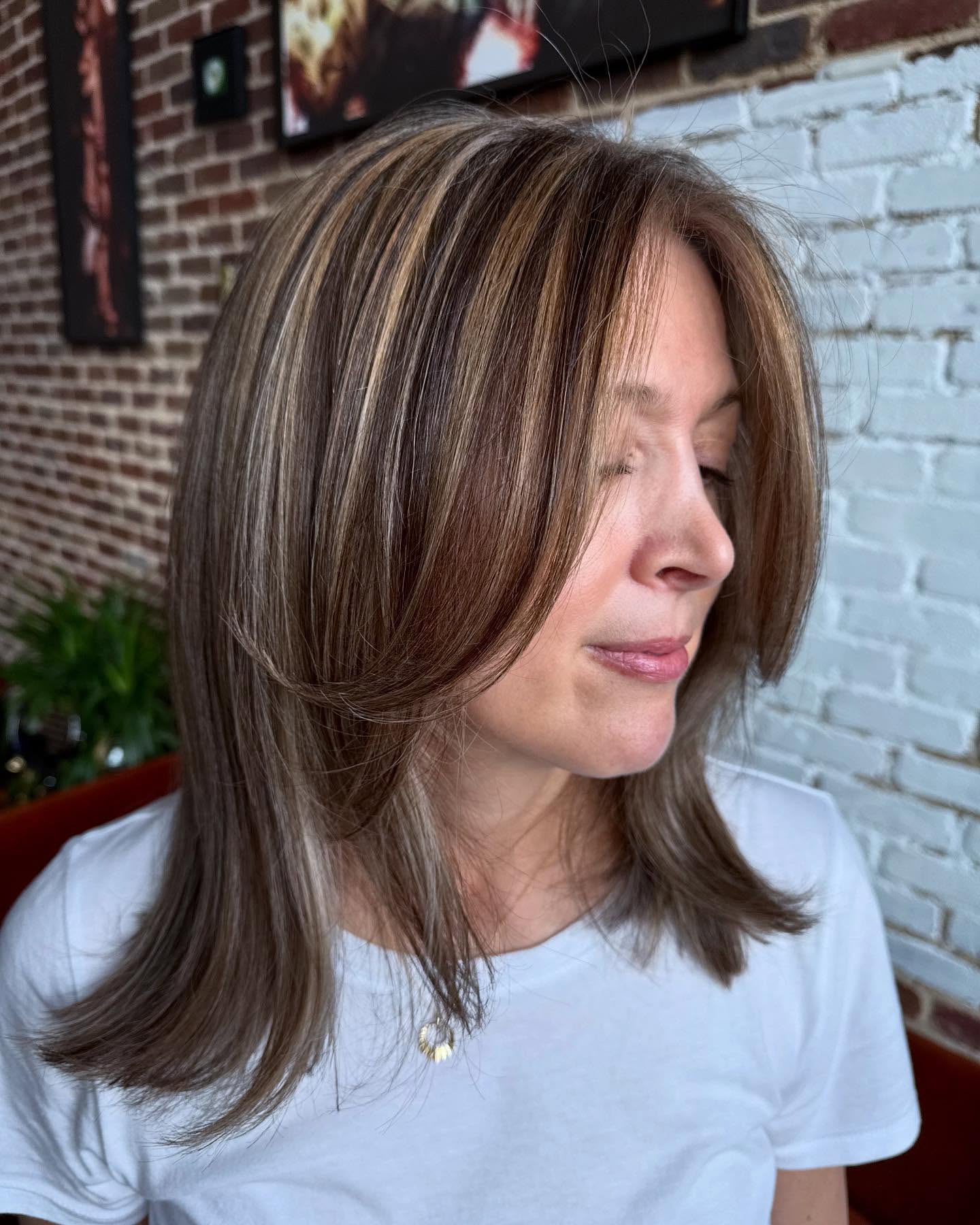 Mid-Length Feathered Brunette with Silver-Threaded Face Frame