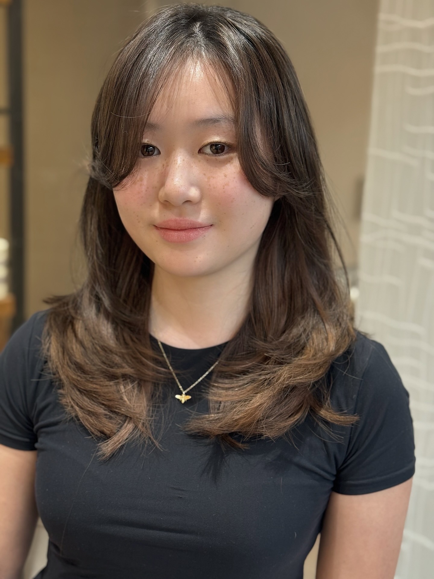Mid-Length Rounded Layers with Gentle C-Shaped Curtain Fringe