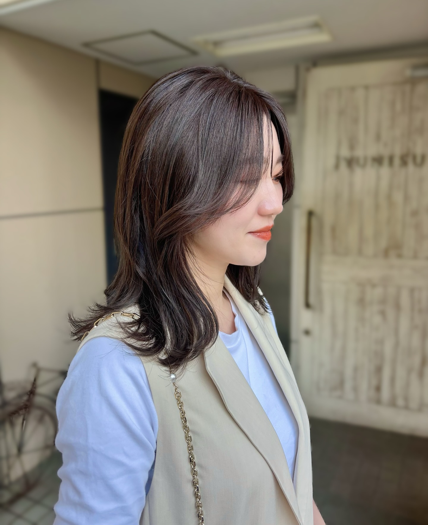 Sleek Chocolate Mid-Length Cut with Subtle Face-Framing Micro Fringe and Outward-Flicked Ends