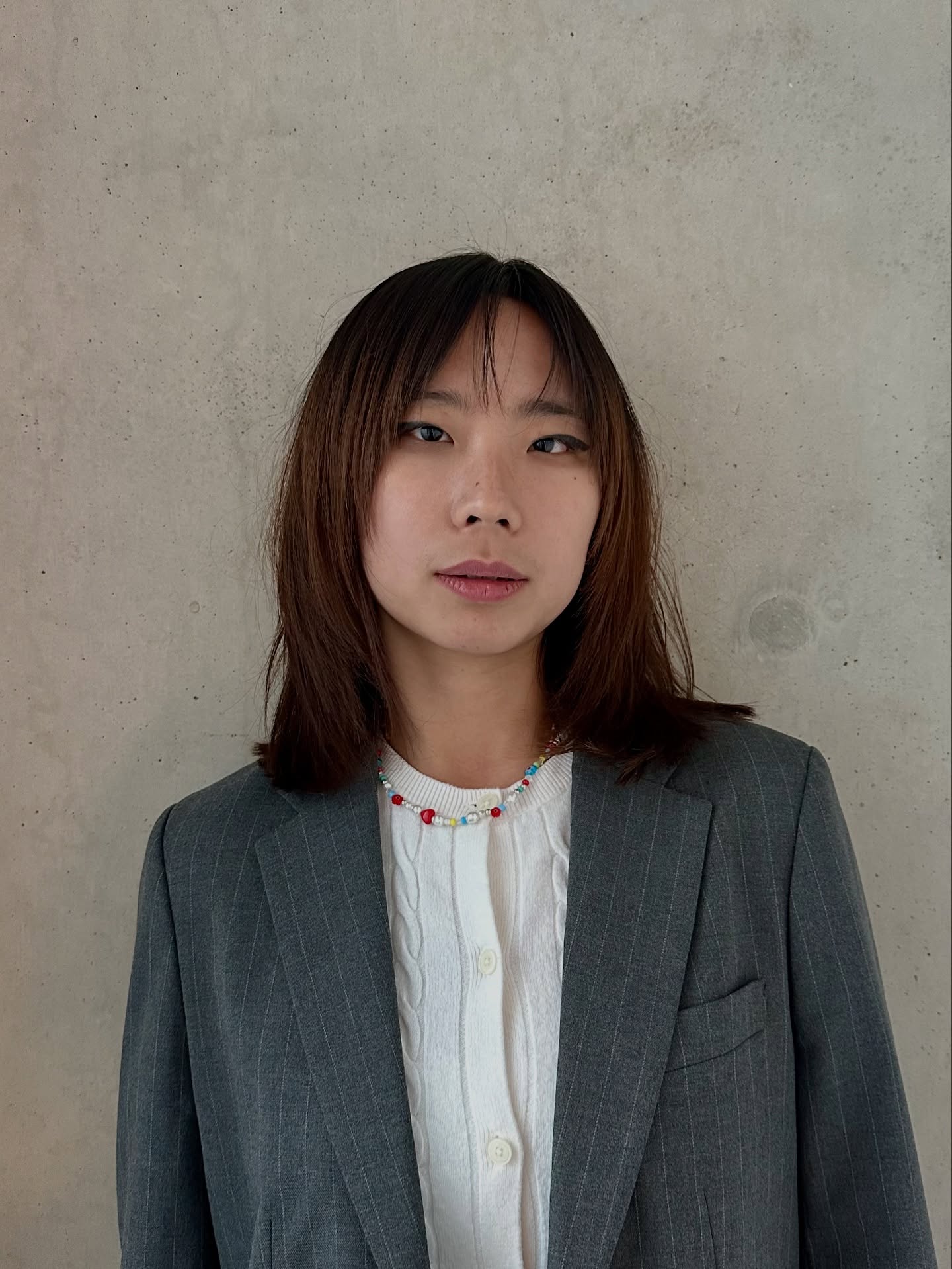 Soft Center-Parted Wispy Fringe with Blunted Shoulder-Length Ends