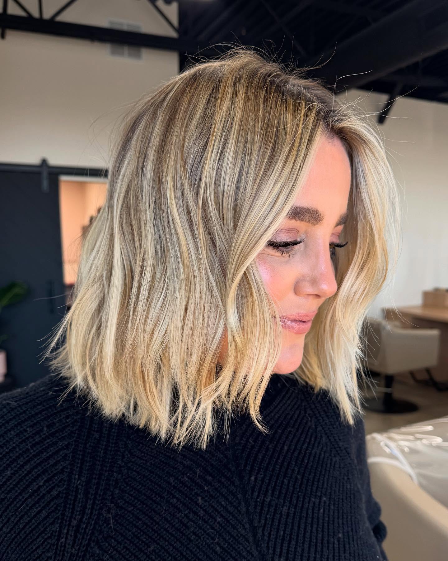 Soft Layered Blonde Collarbone Lob with Feathered Interior
