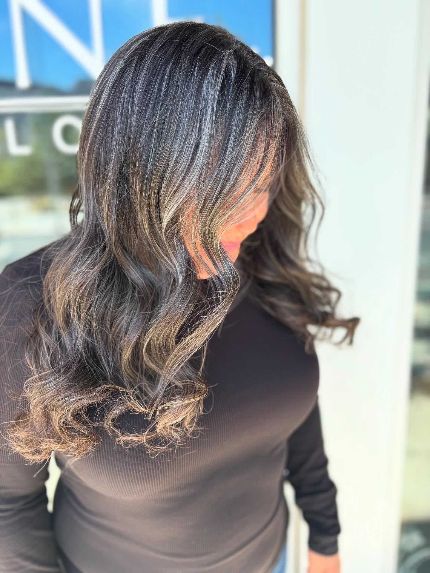 Soft Silver-Threaded Brunette with Face-Framing Wave Layers