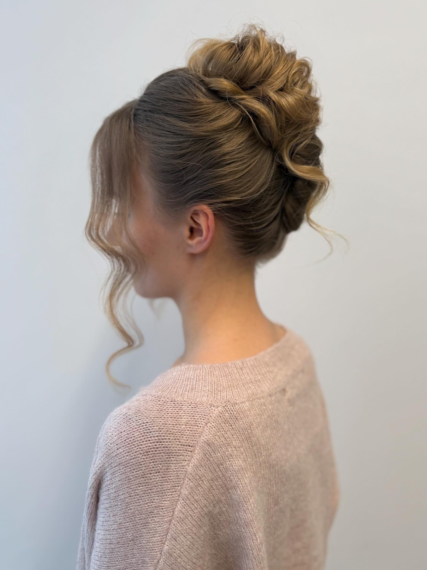 Soft Twisted Bouffant Updo with S-Shaped Face-Framing Tendrils