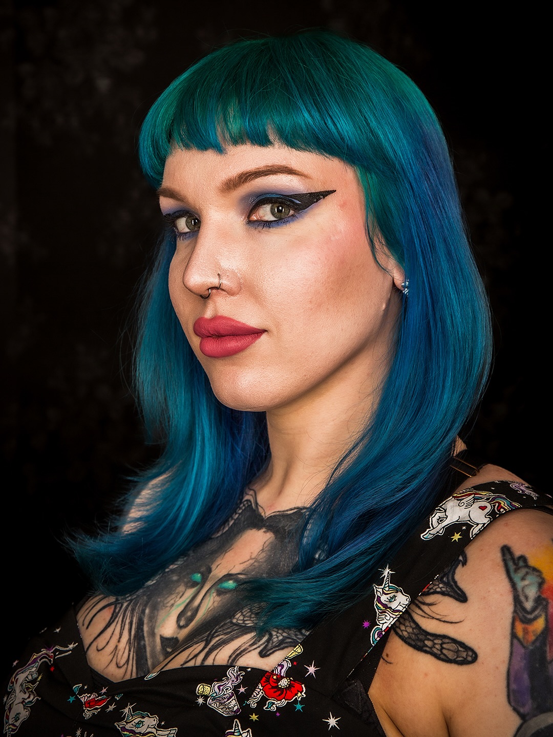 Teal Blue Shoulder-Length Cut with Micro Fringe and Face-Framing Layers