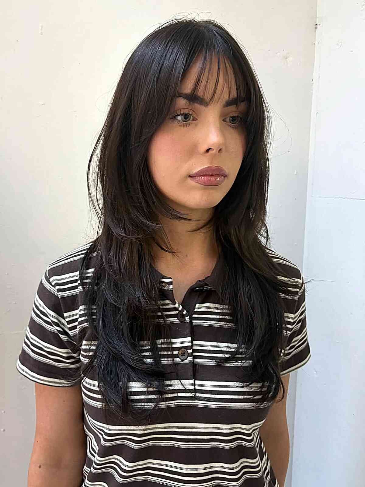 Chic Wispy Bangs with Long Layers
