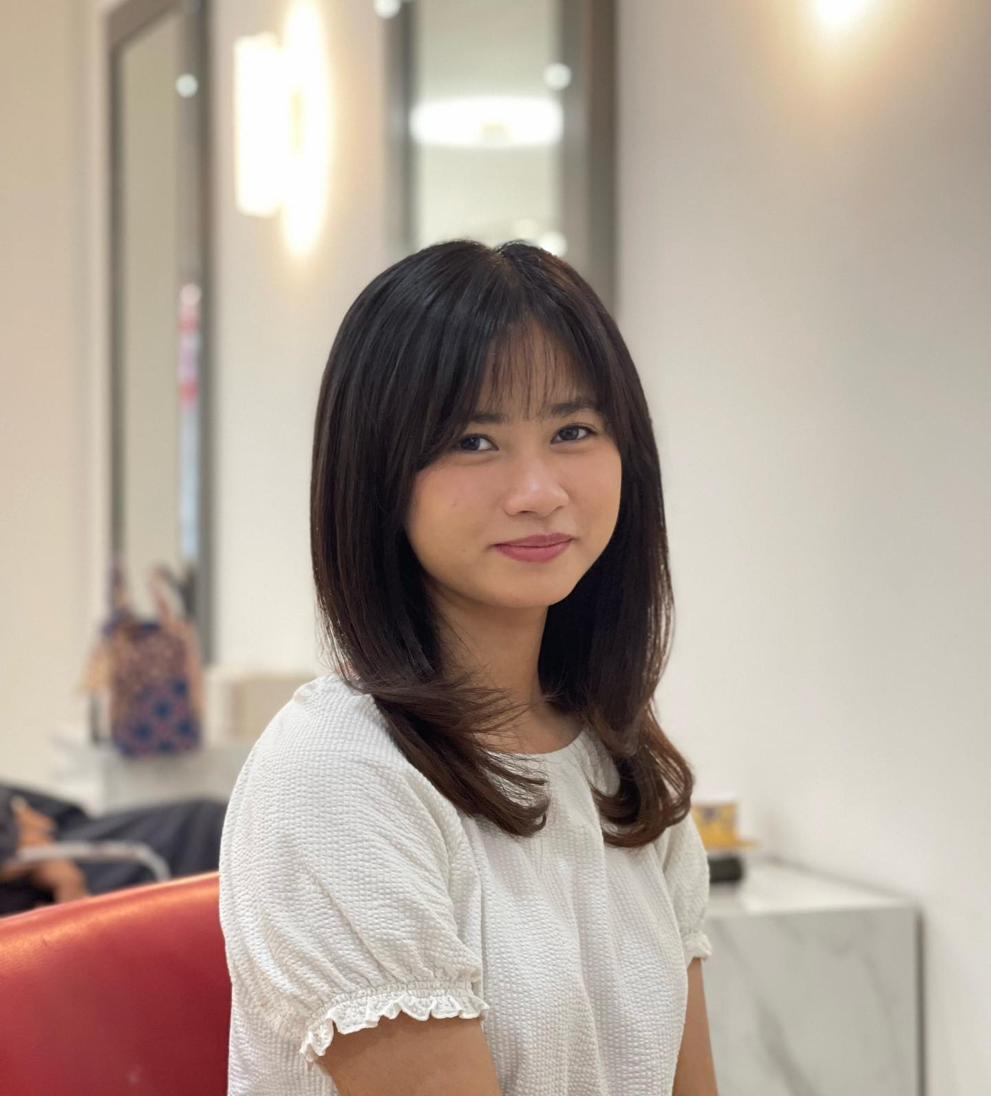 Face-Framing Mid-Length Lob with Wispy Curtain Fringe