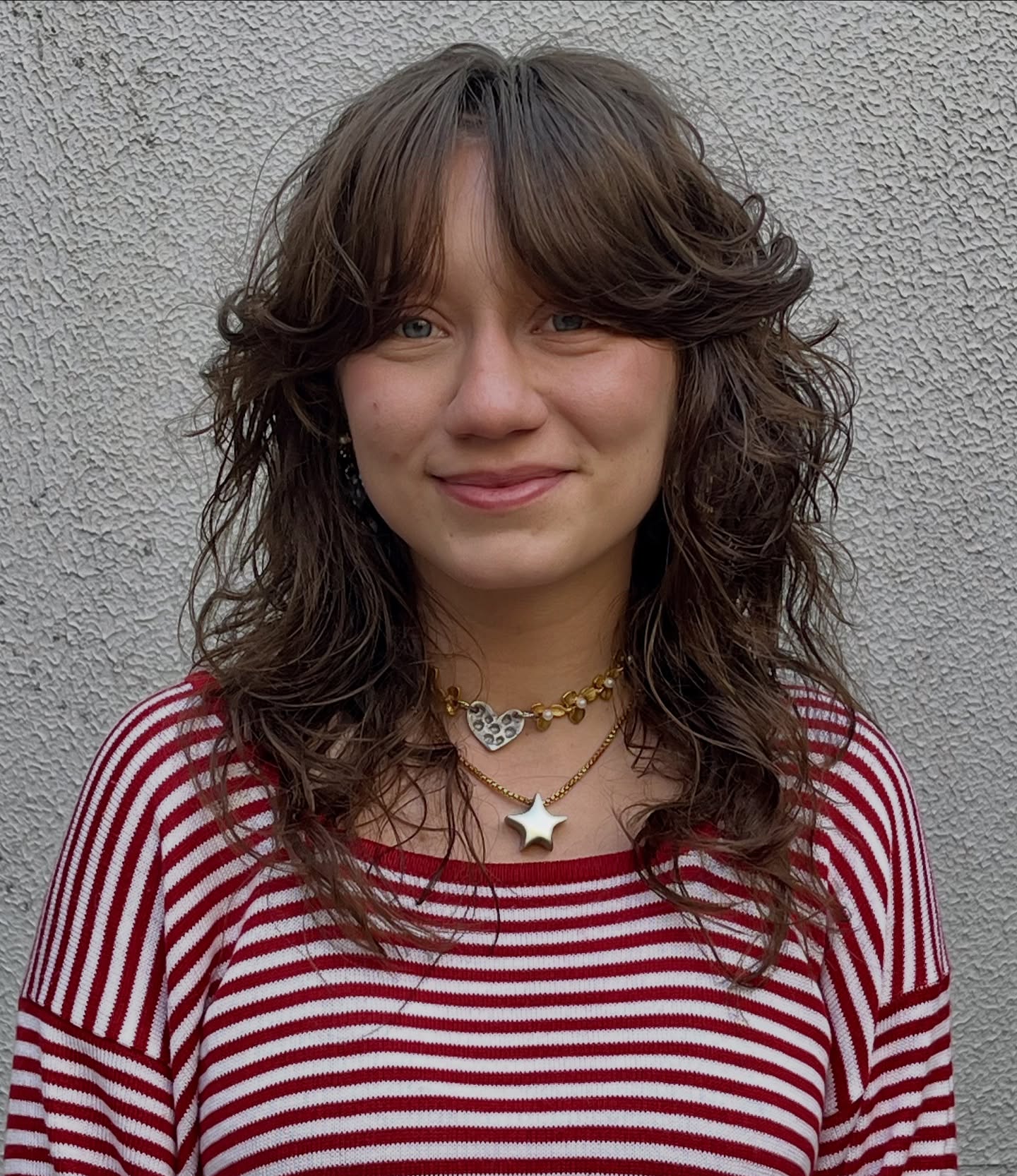 Feathered Brown Shag with Curtain Bangs and Textured Ends