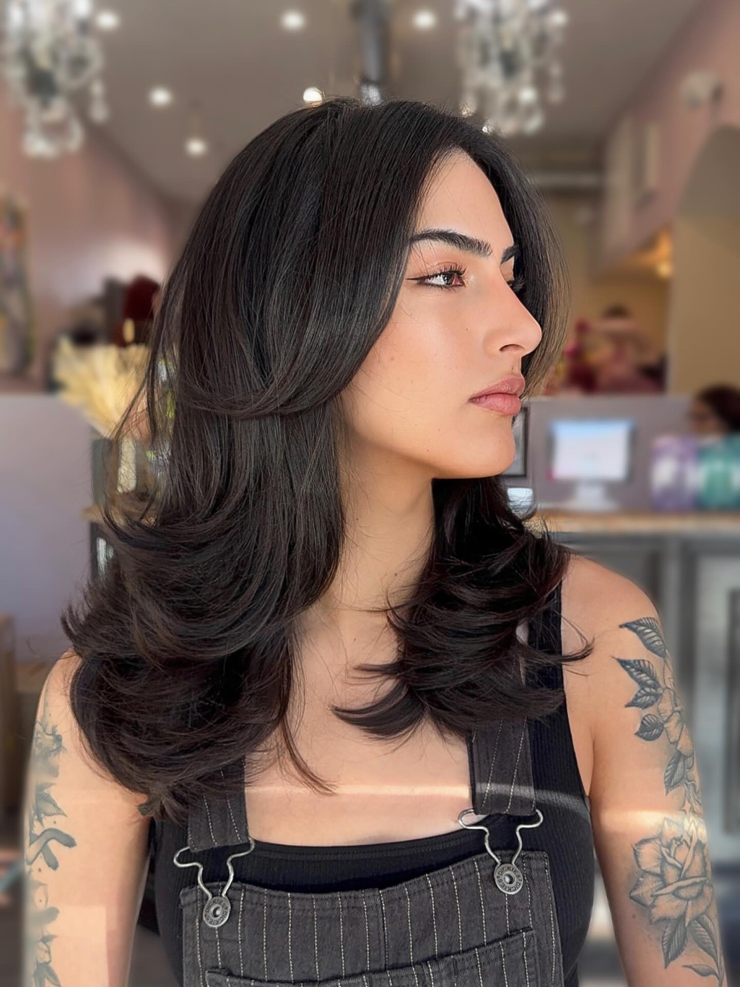 Feathered Shoulder-Length Cut with Face-Framing Curtain Layers