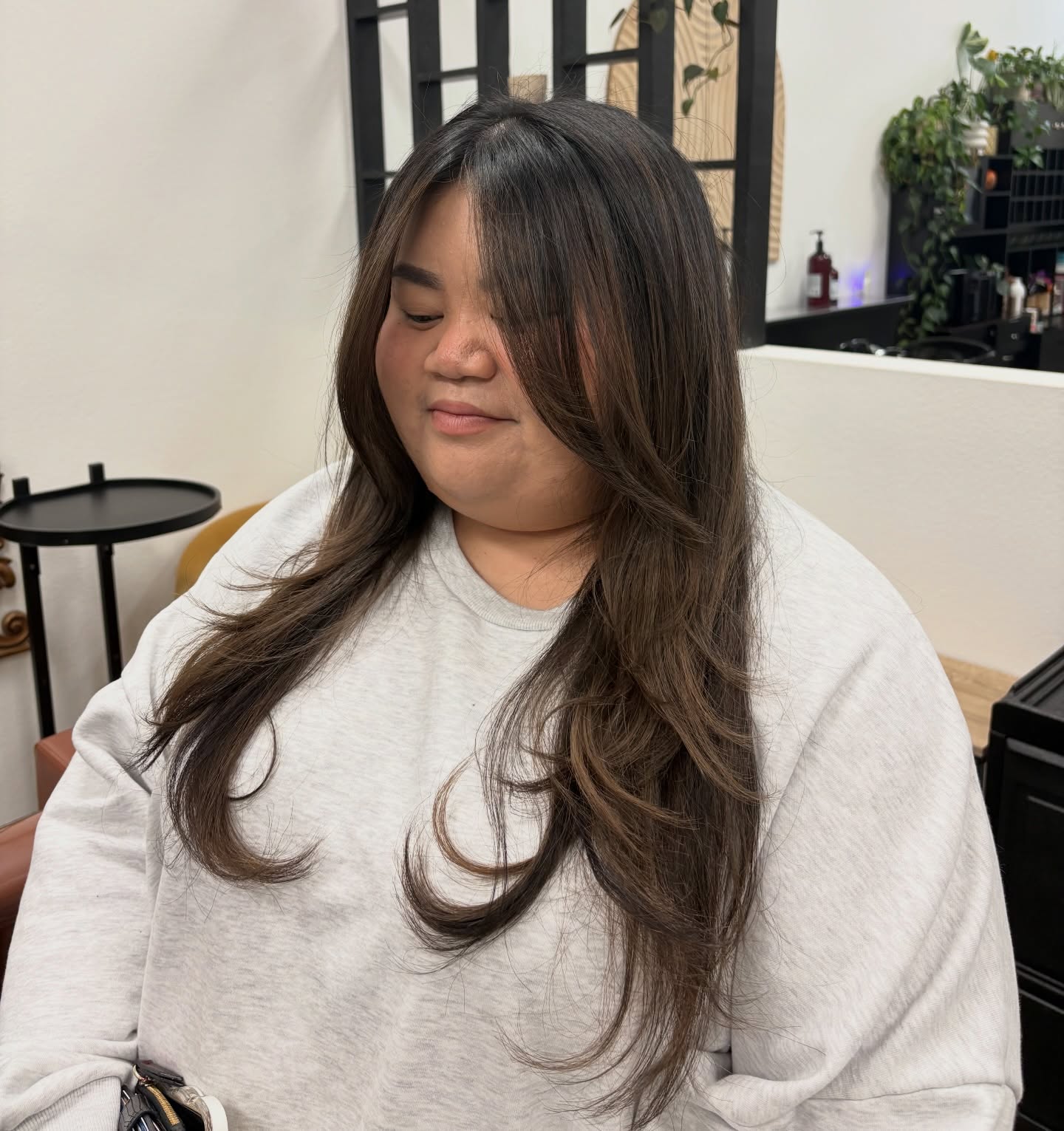 Long Feathered Face-Framing Layers with Copper Peek