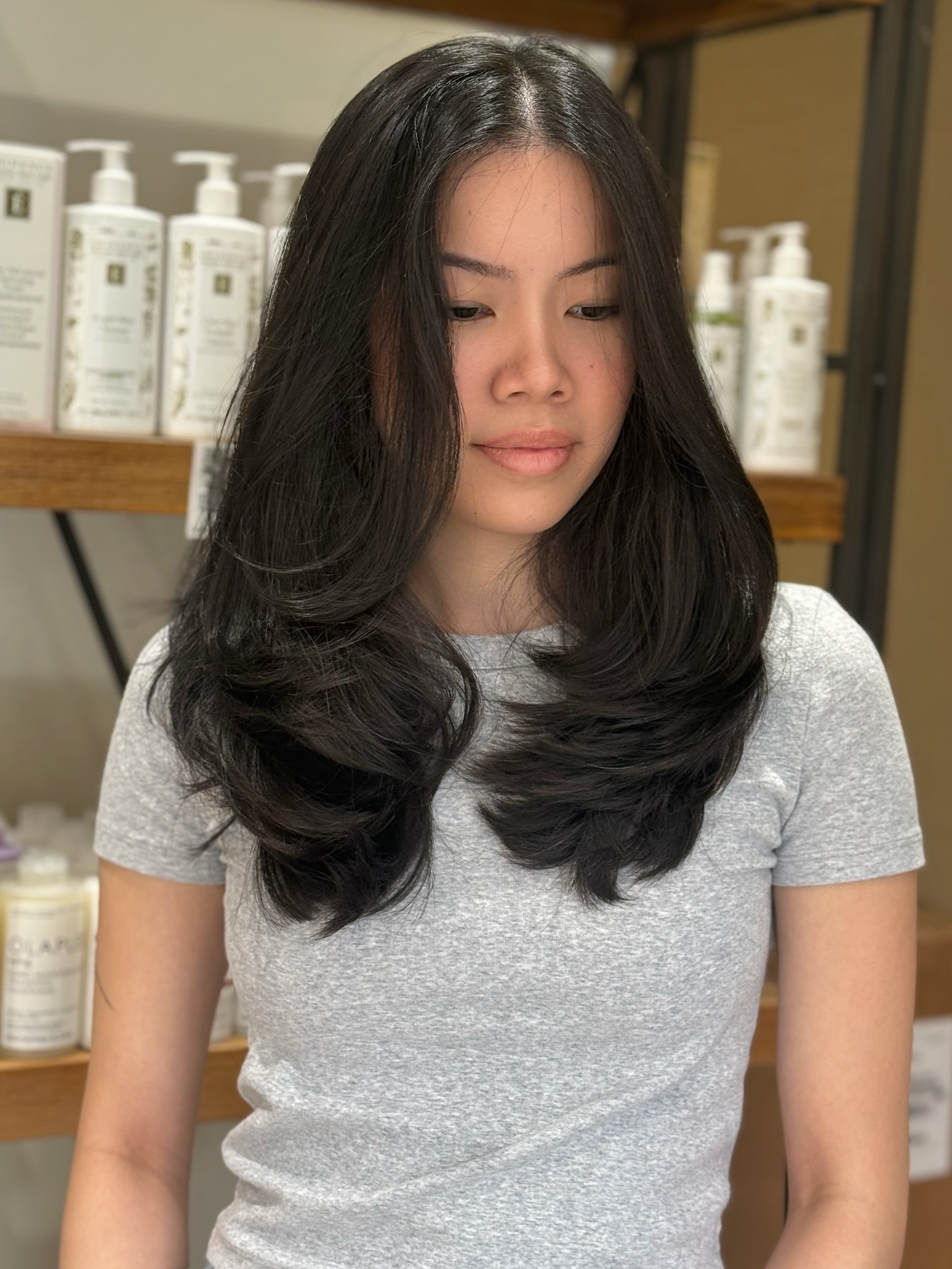 Mid-Chest Rounded Layered Cut with Subtle Center Curtain