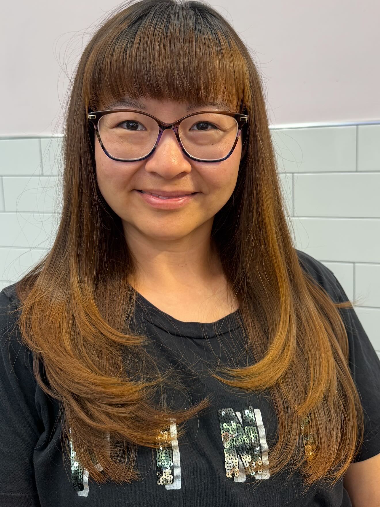Rounded Long Layers with Blunt Brow Fringe and Warm Balayage