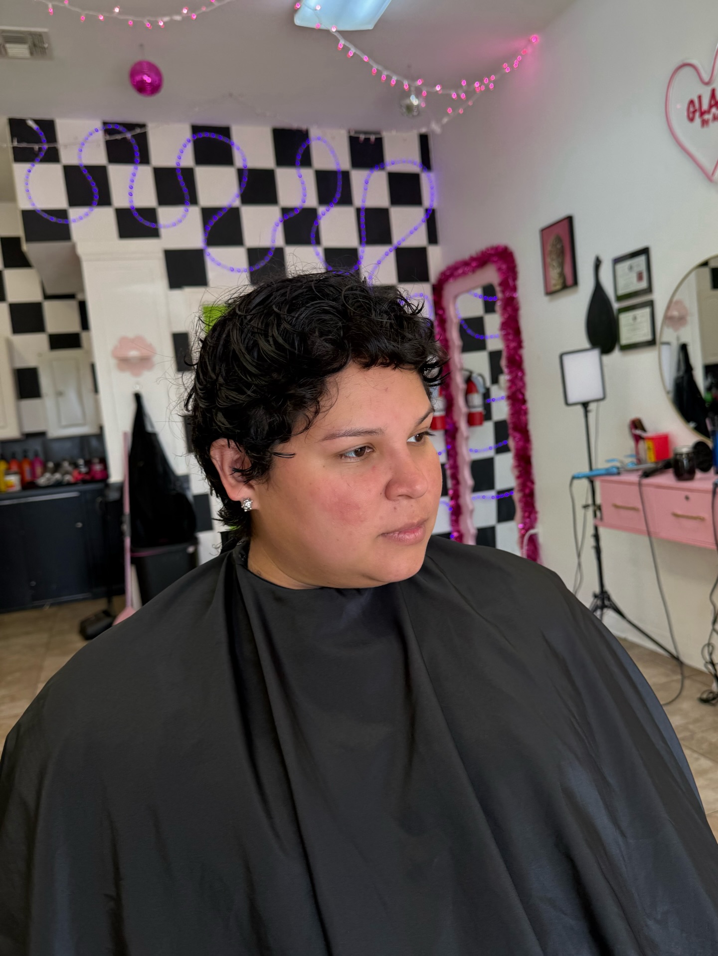 Short Curly Pixie with Tapered Nape and Face-Framing Texture