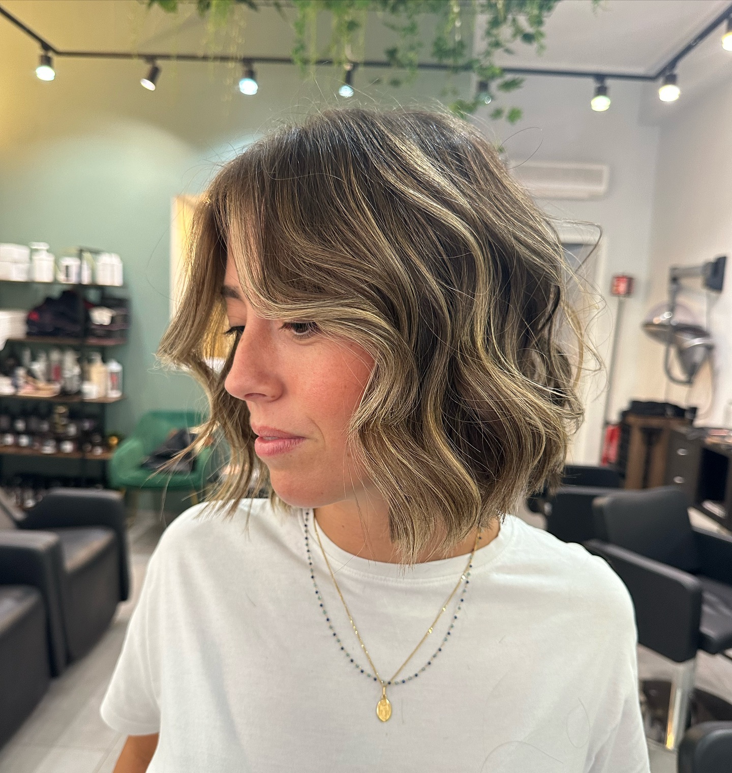 Textured Wavy Chin-Length Bob with Soft Curtain Fringe