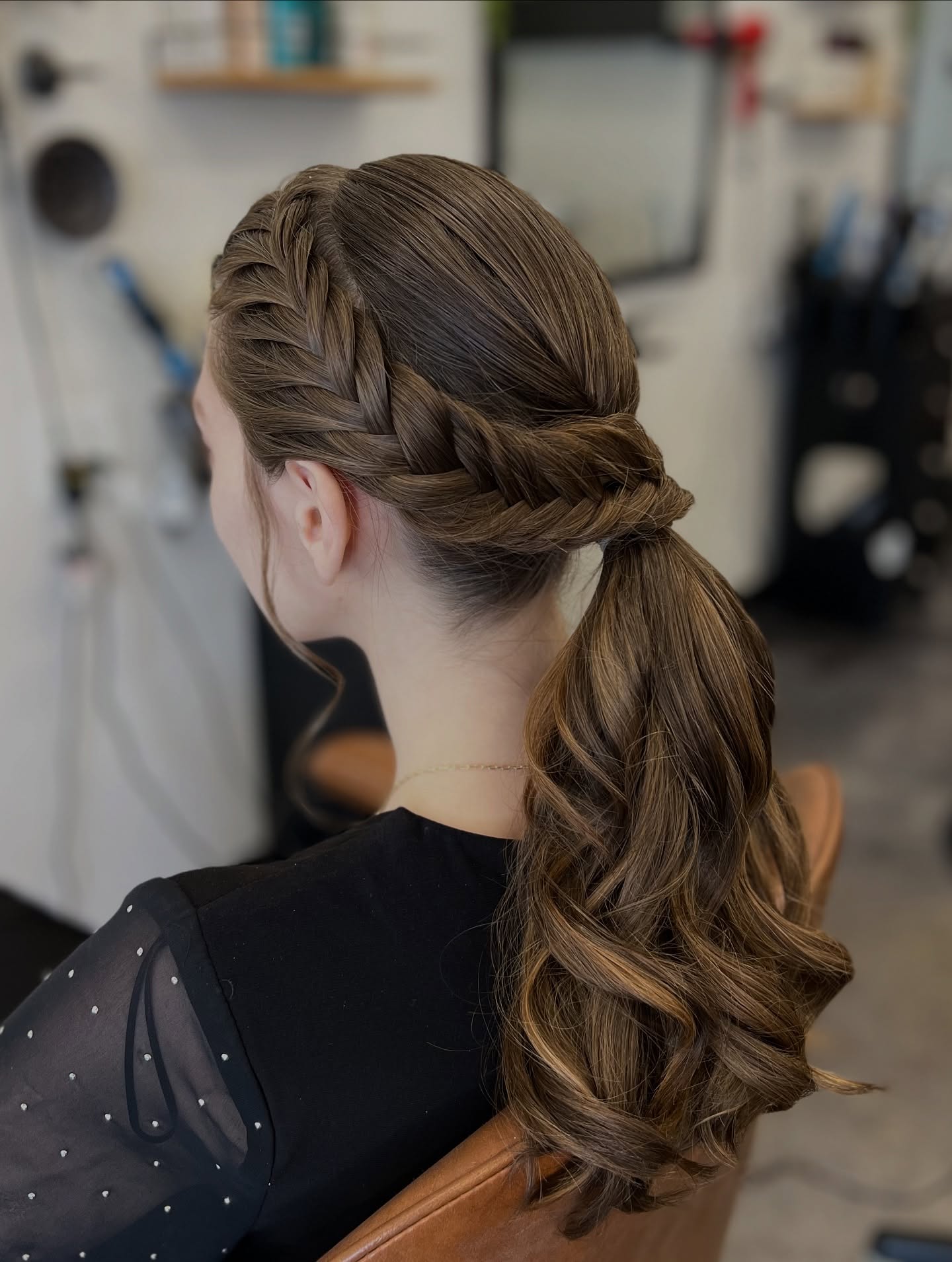 Wrapped Dutch Side Braid into Low Sculpted Ponytail