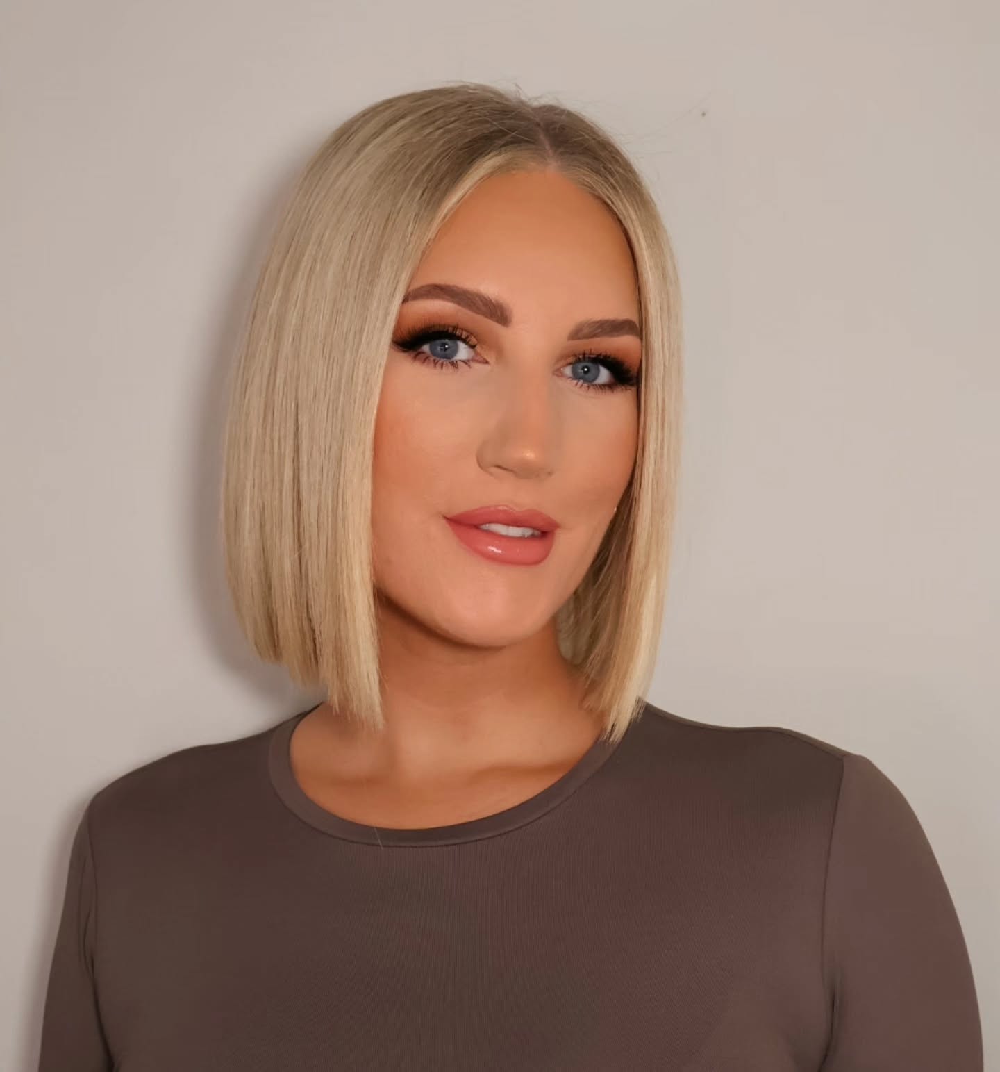 Sleek Center-Part Precision Blunt Bob with Soft Inner Bevel