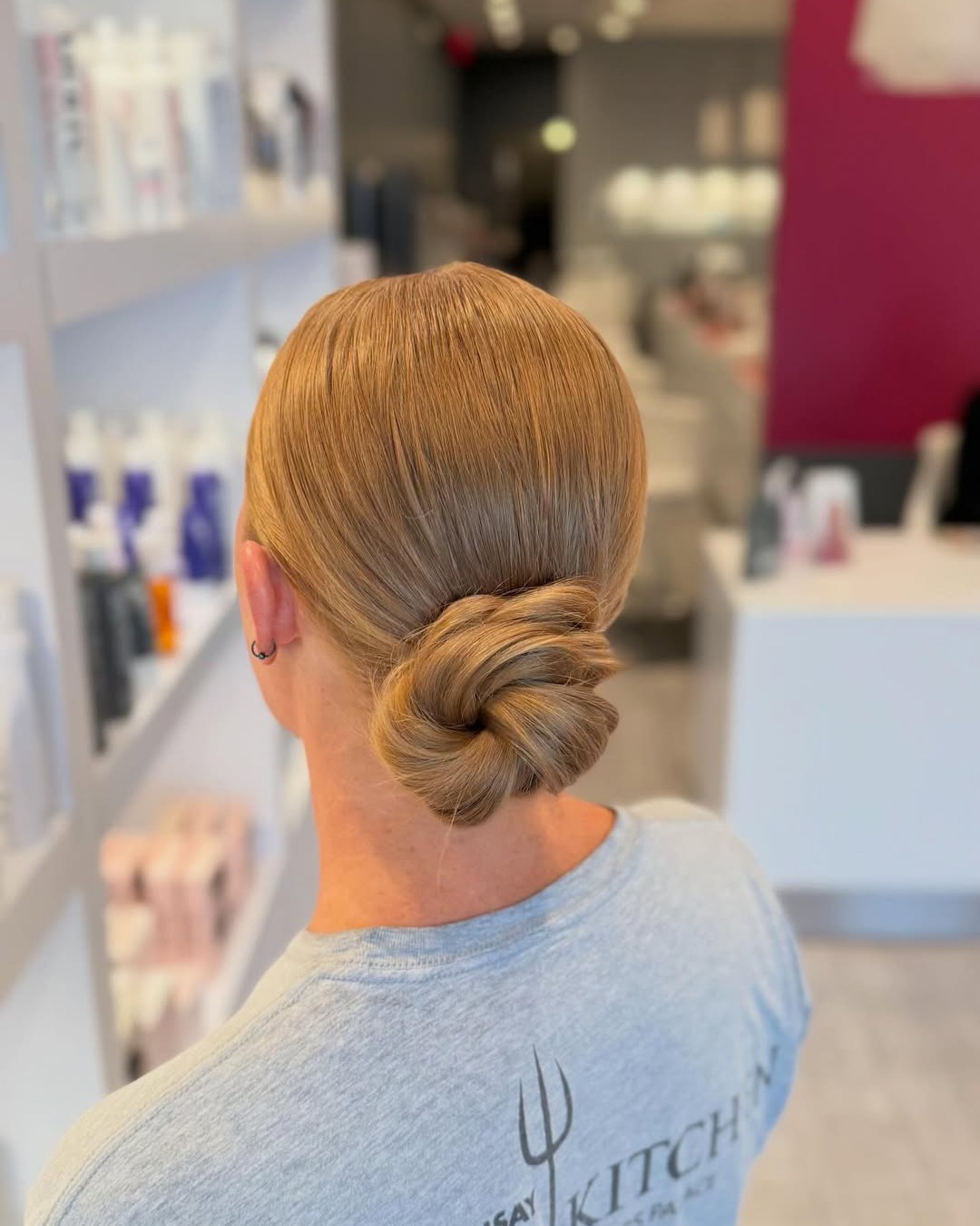 Sleek Low Twisted Knot with Tucked Finish