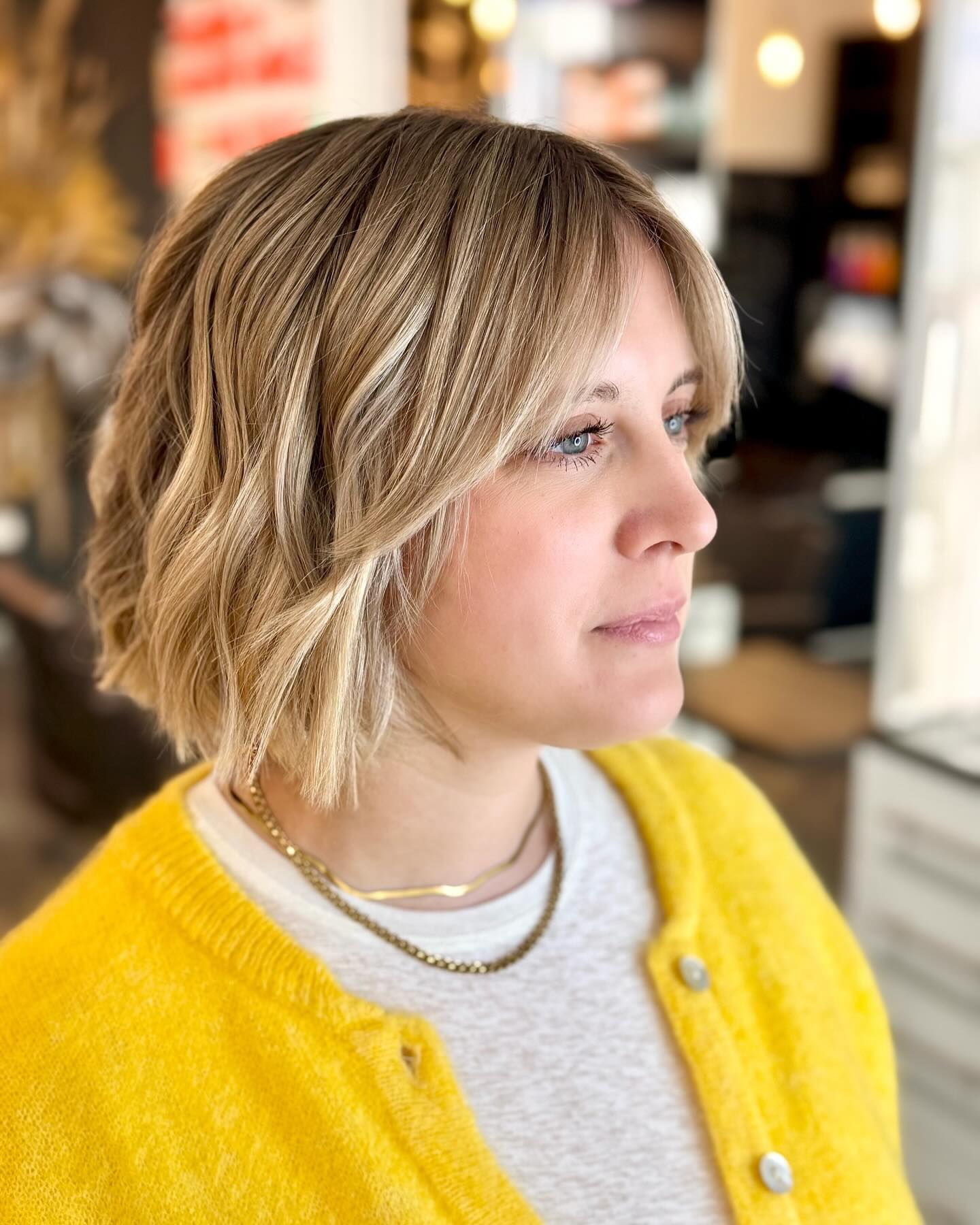 Soft Layered Chin-Length Bob with Curtain Fringe