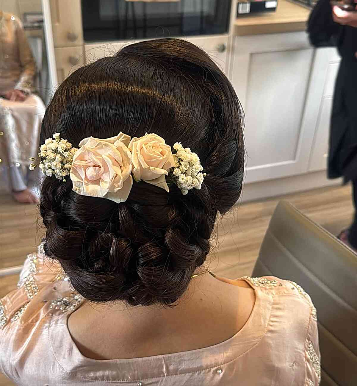 Elegant Braided Updo with Floral Accents