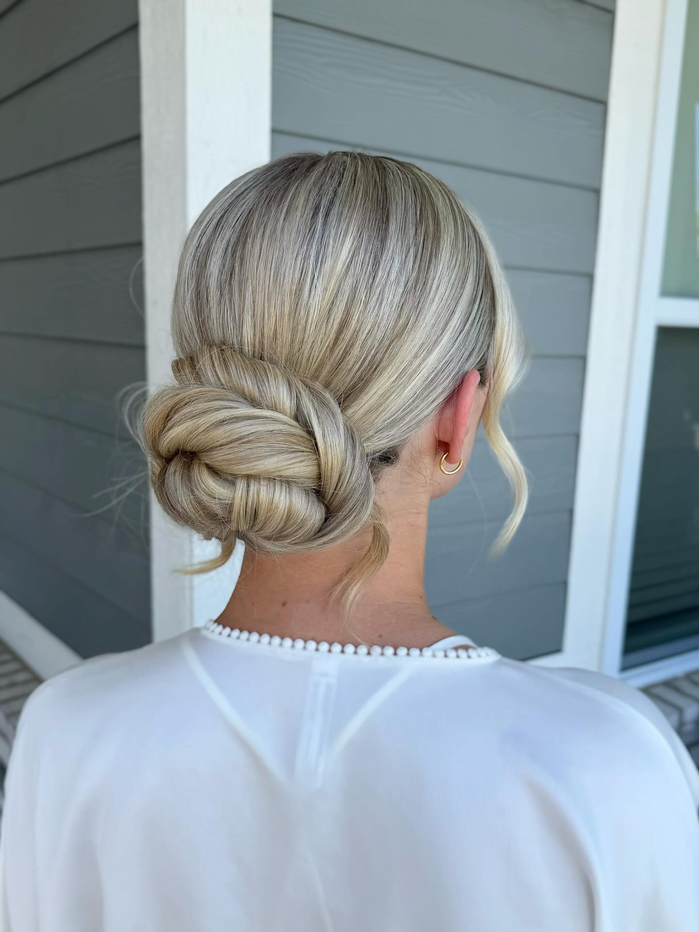 Low Folded Rosette Chignon with Ash-Pearl Babylights