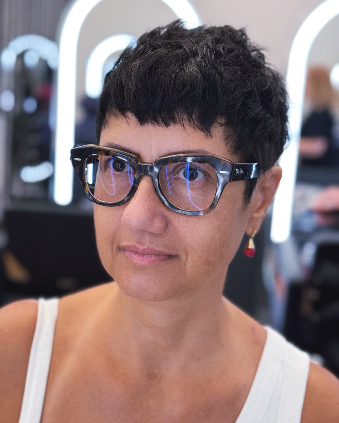 Short Textured Pixie with Jagged Baby Bangs and Tapered Sides