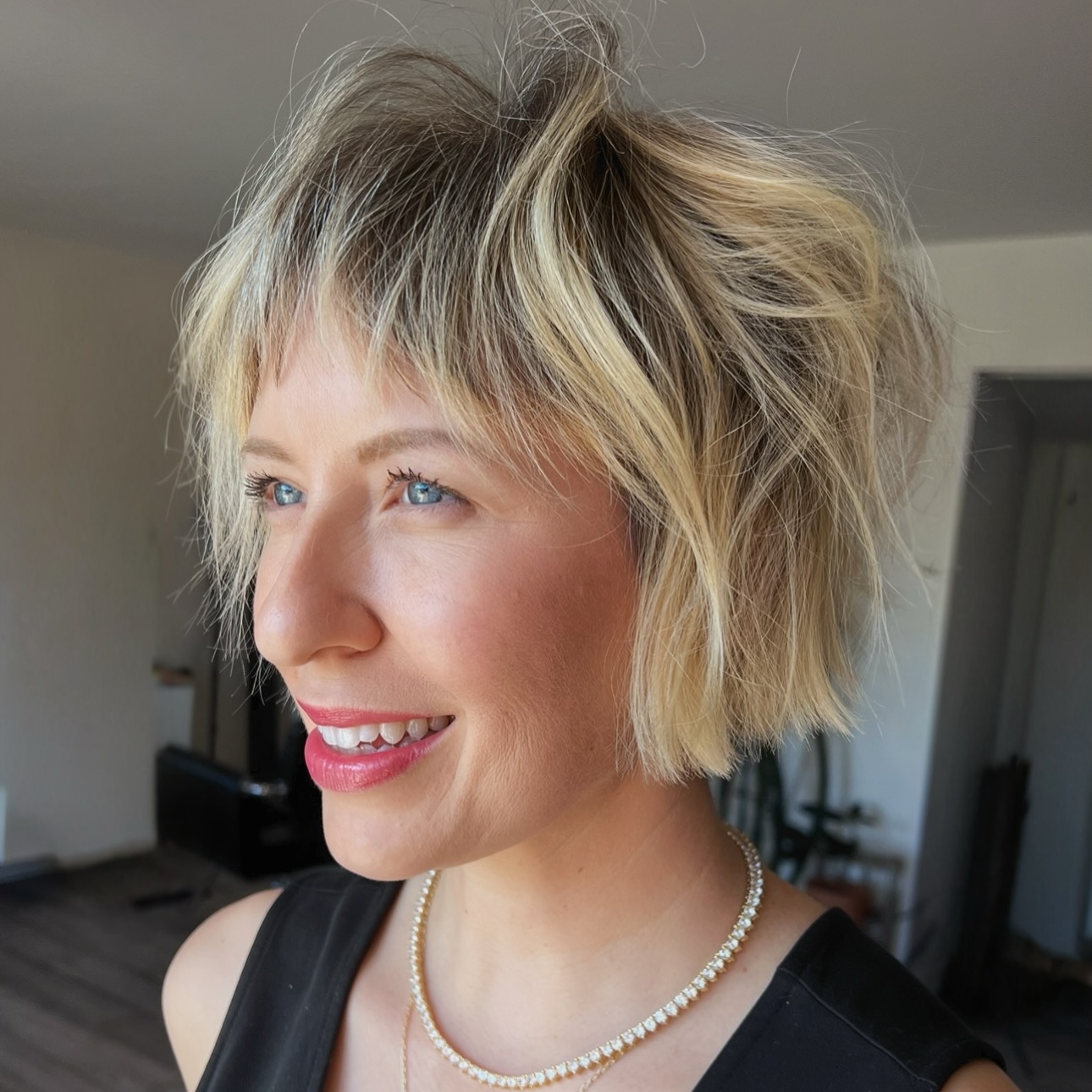 Choppy Chin-Grazing Bob with Micro Fringe and Root Melt