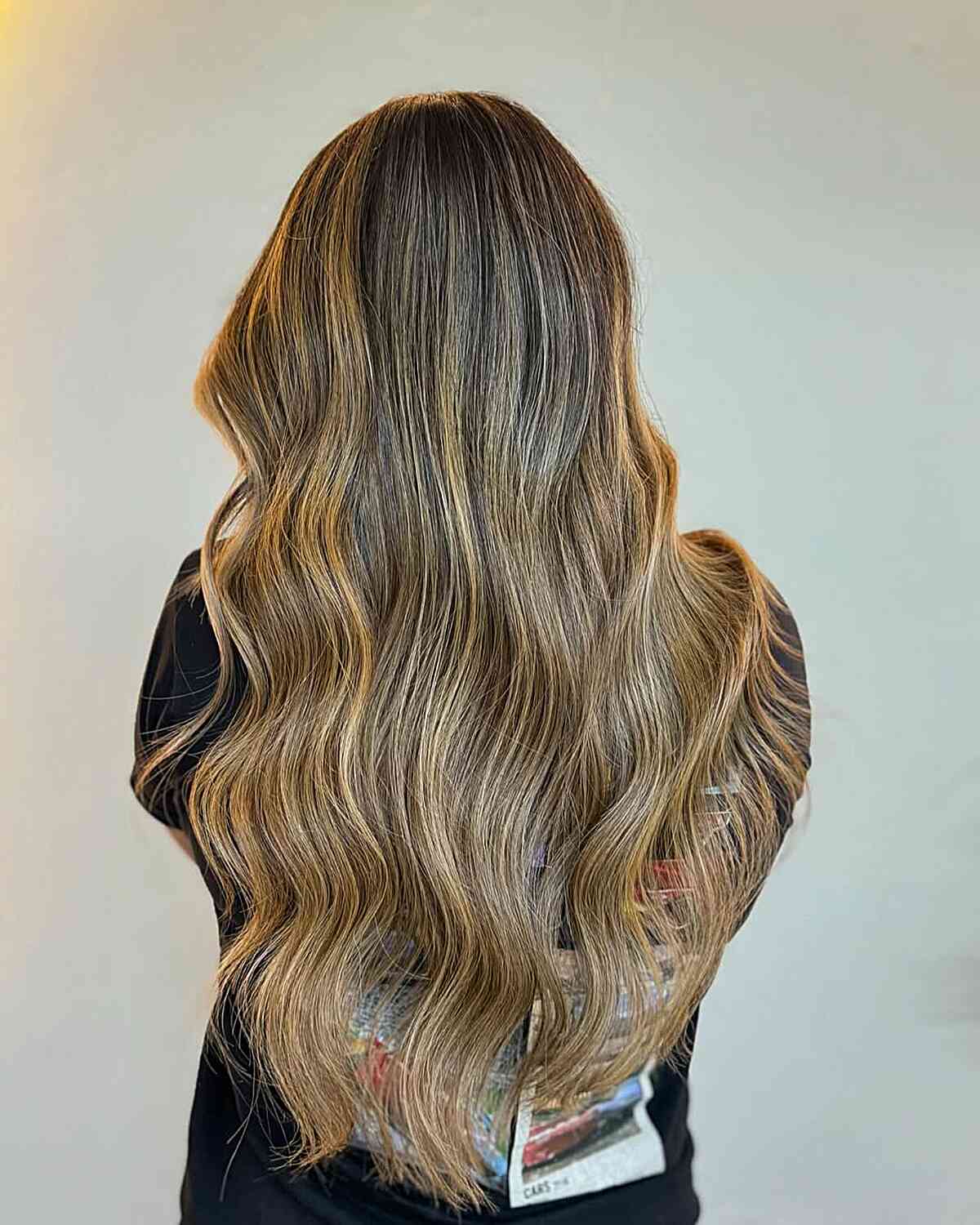 Long Wavy Balayage with Subtle Lighter Highlights