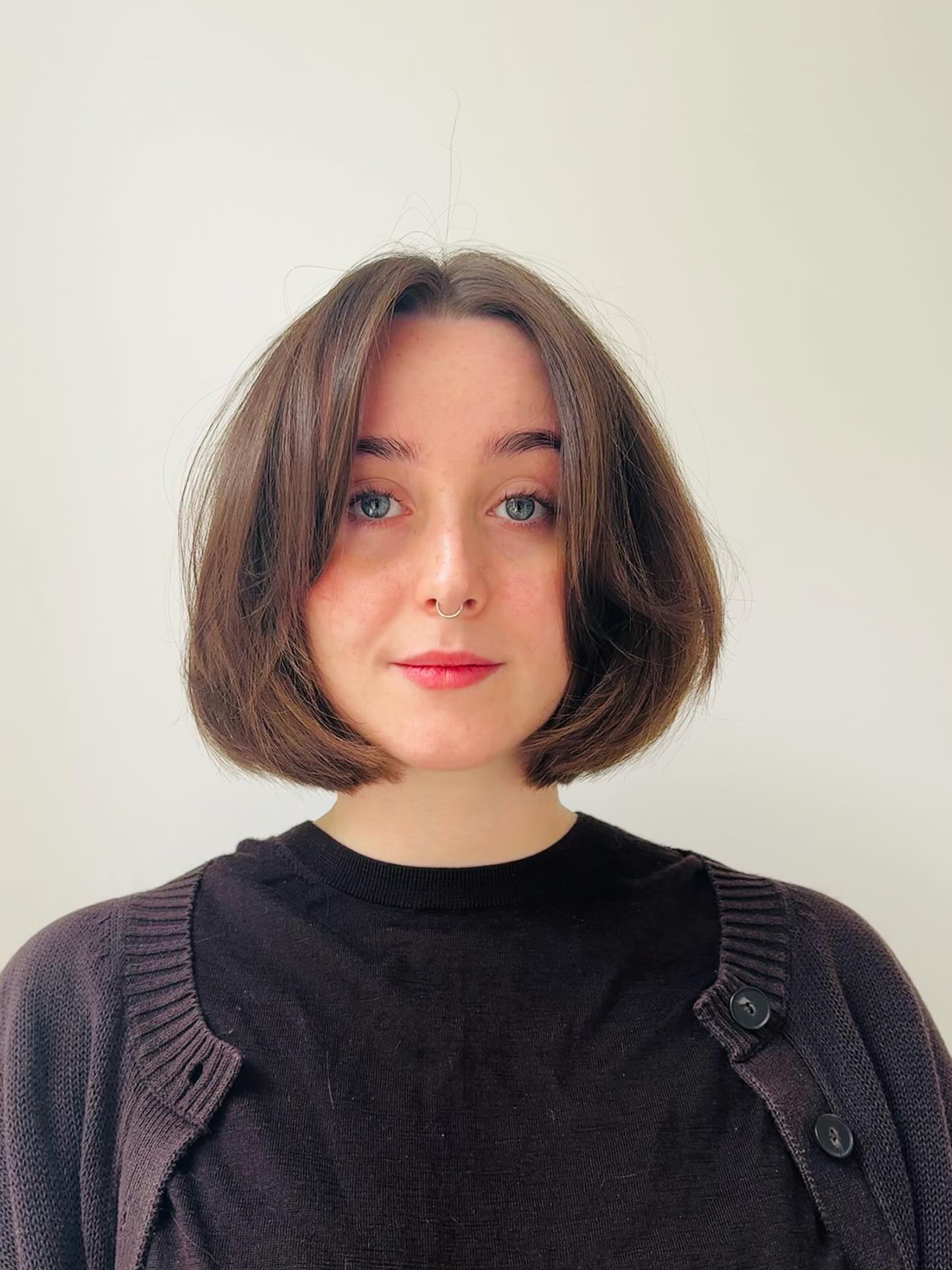 Rounded Chin-Length Bob with Soft Curtain Part and Interior Graduation