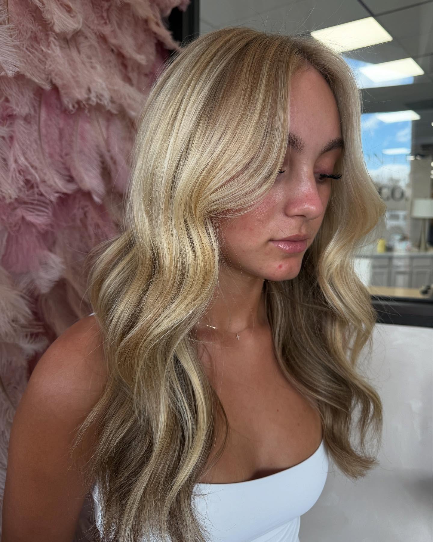 Face-Framing Curtain Layers with Warm Blonde Balayage and Dimensional Lowlights