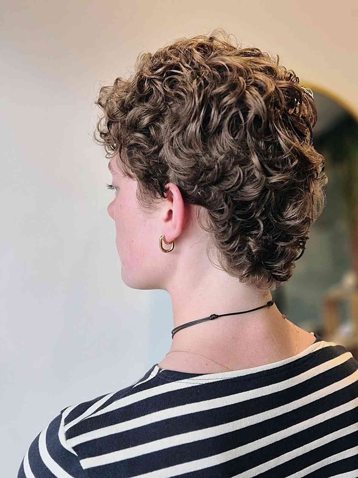 Textured Short Curly Hairstyle with Defined Curls