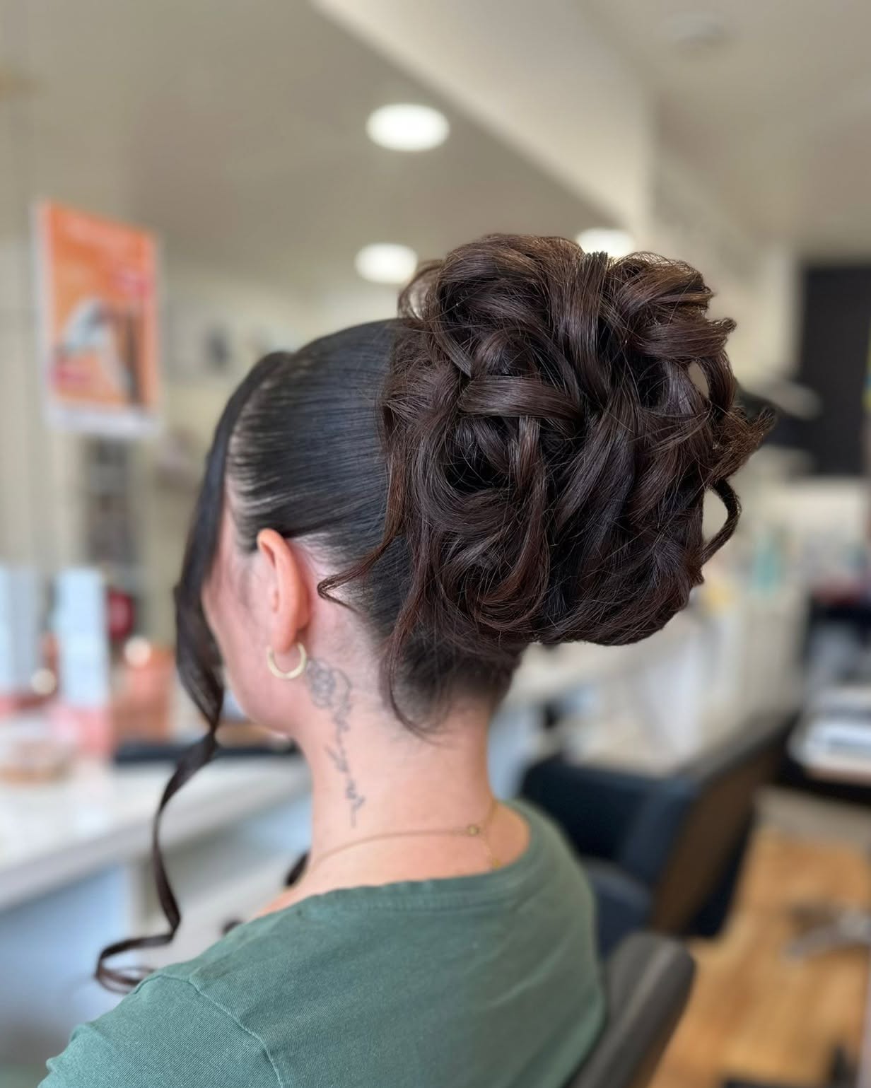 Sleek High Loop Bun with Woven Textured Top