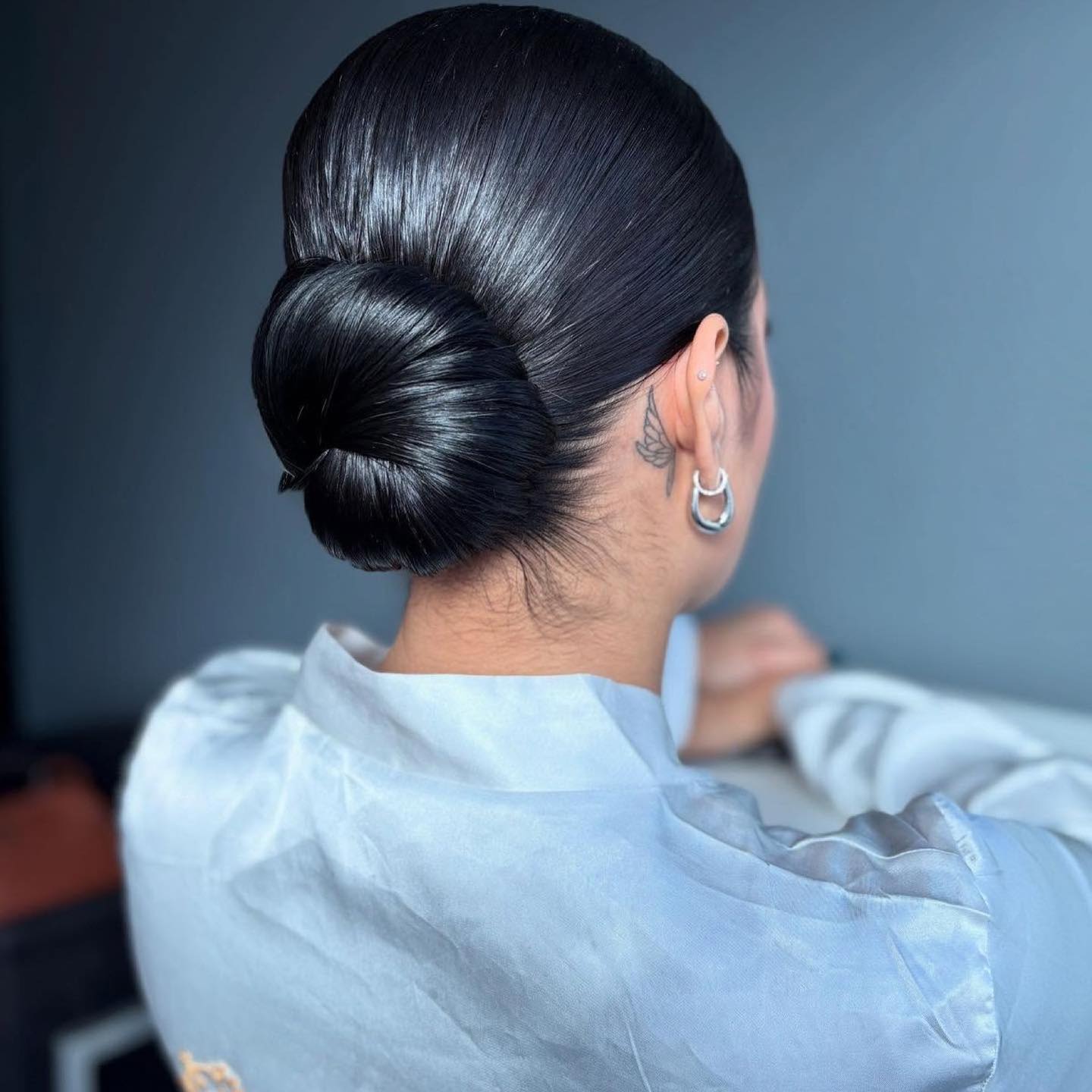 Sleek Low Wrapped Chignon