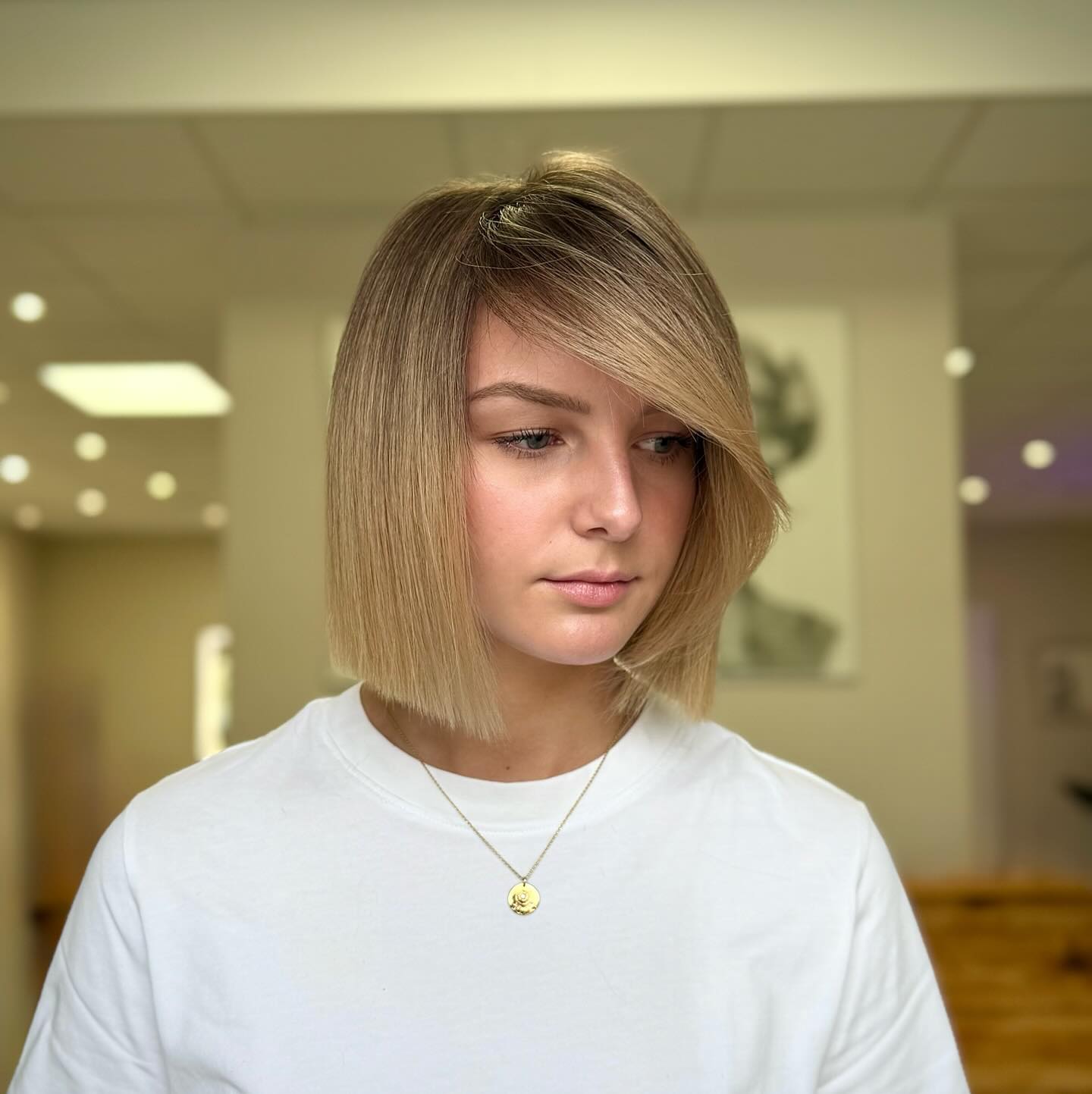 A-Line Blunt Bob with Long Diagonal Fringe and Root Smudge