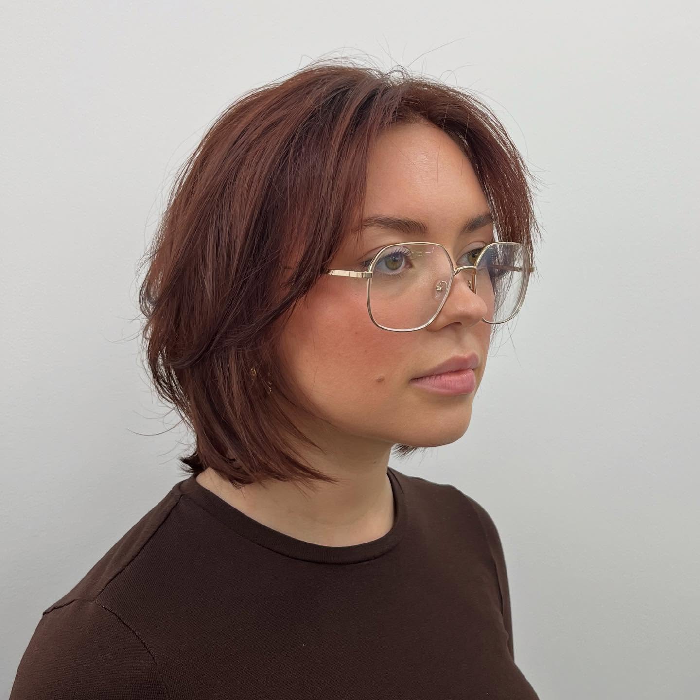 Auburn Textured Jaw-Length Layered Bob with Soft Face-Framing