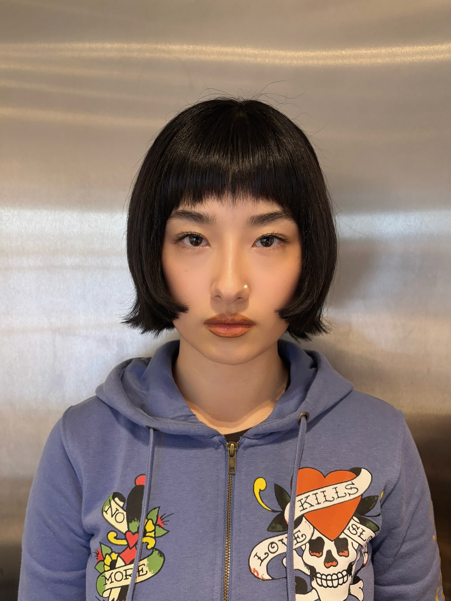 Chopped Chin-Length Bob with Cropped Notched Micro-Bangs