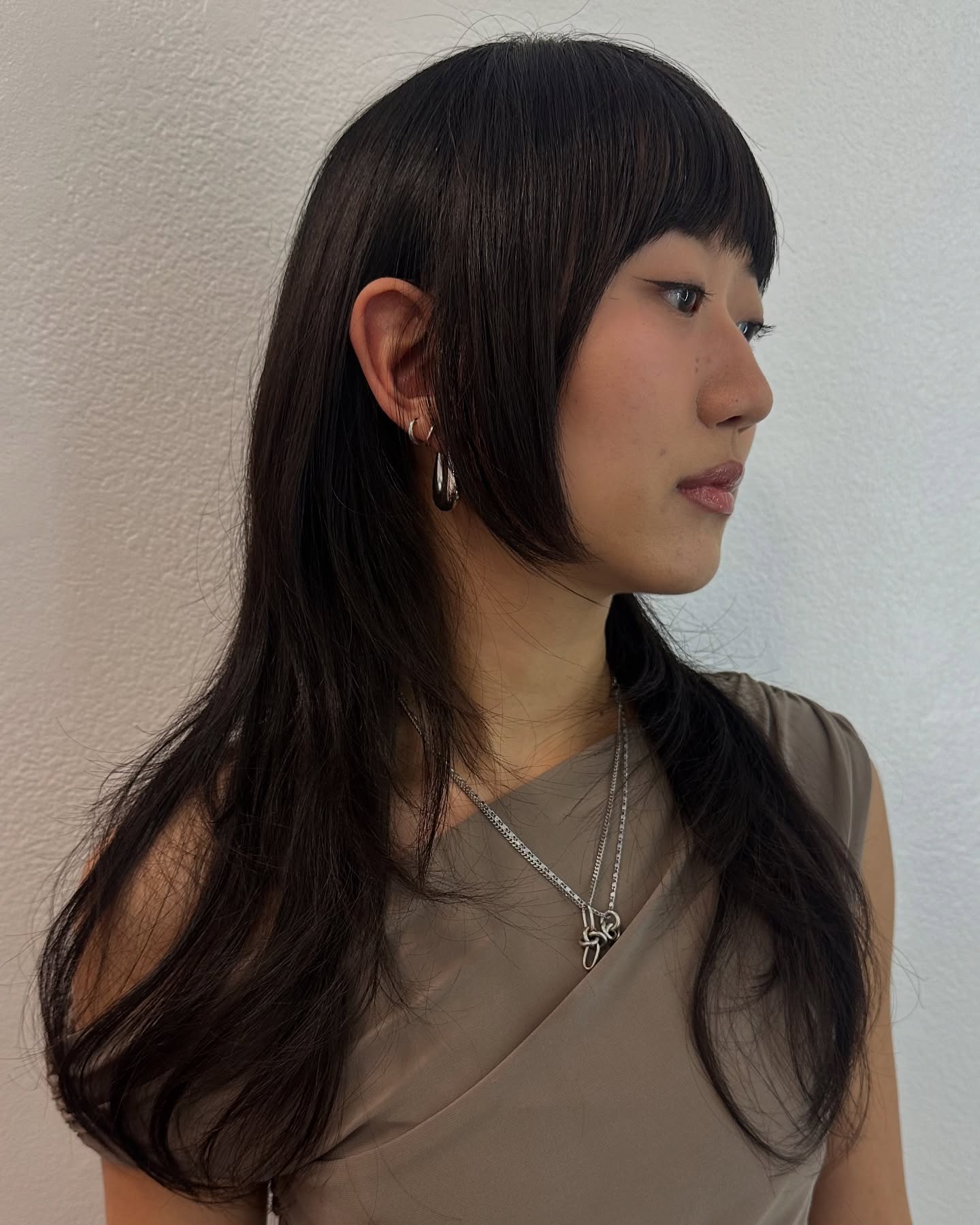 Edgy Long Shag with Ear-Length Disconnected Underlayer and Textured Micro-Bang