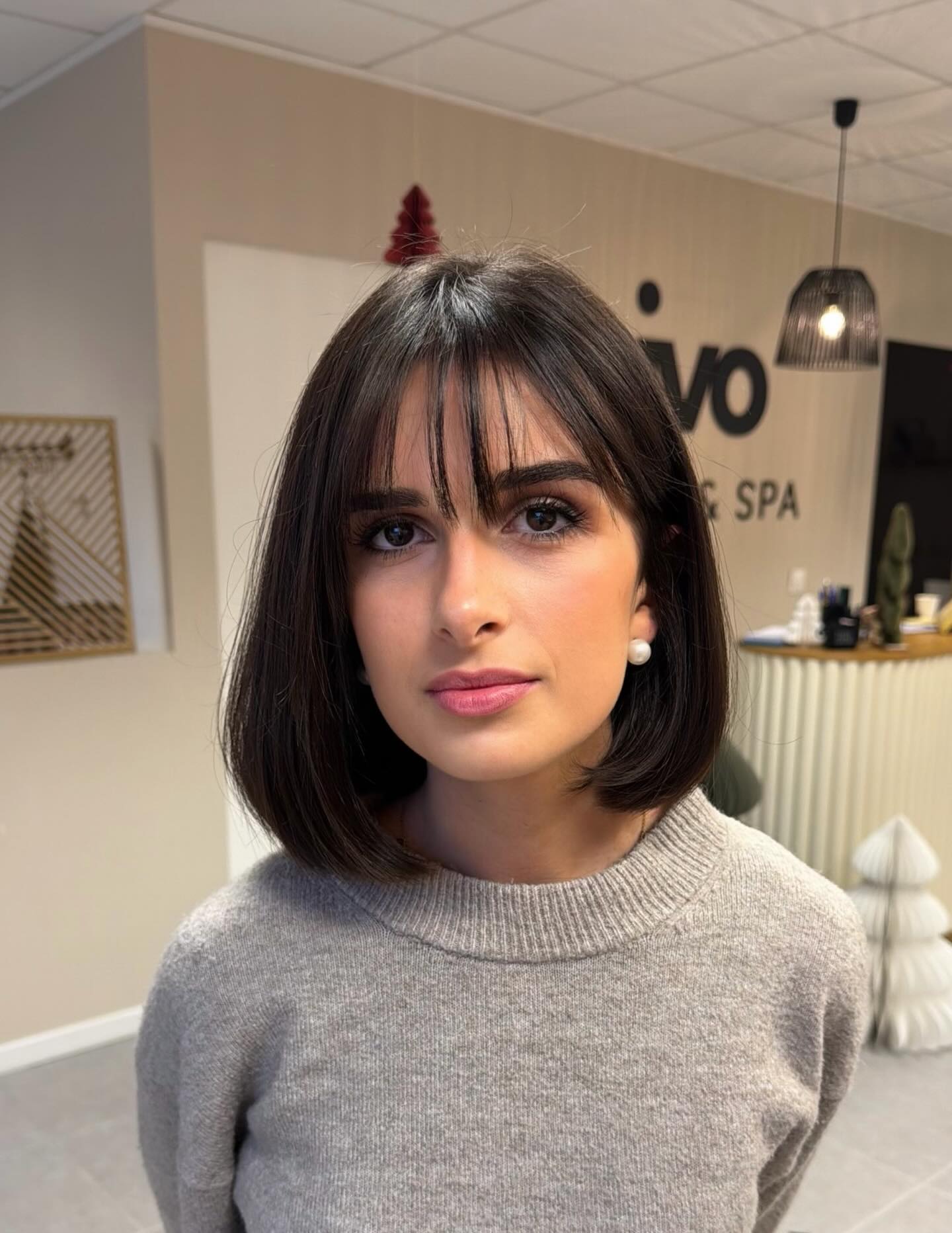 Glossy Chin-Length Rounded Bob with See-Through Curtain Fringe