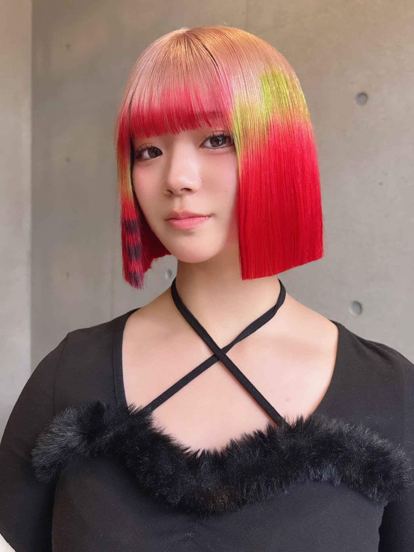 Graphic Blunt Chin-Length Bob with Neon Paneling and Micro-Bangs