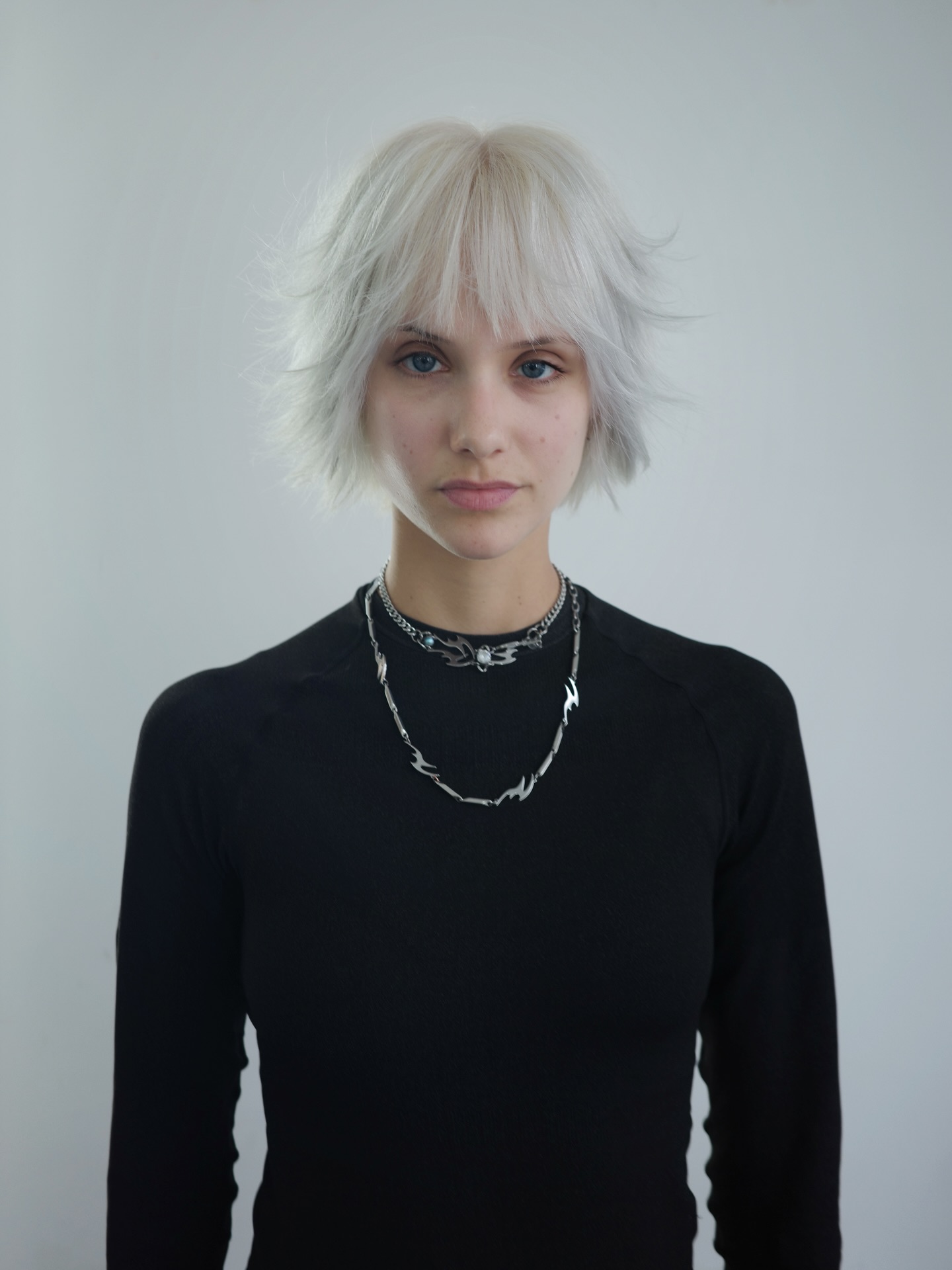 Icy Platinum Feathered Shag Bob with Wispy Fringe