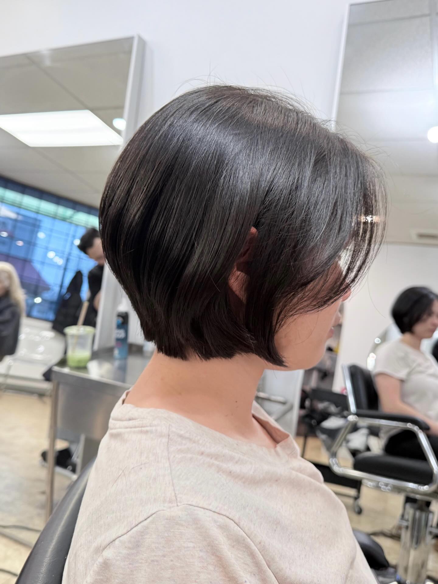 Polished Chin-Grazing Bob with Tapered Nape and Face-Framing Wisps