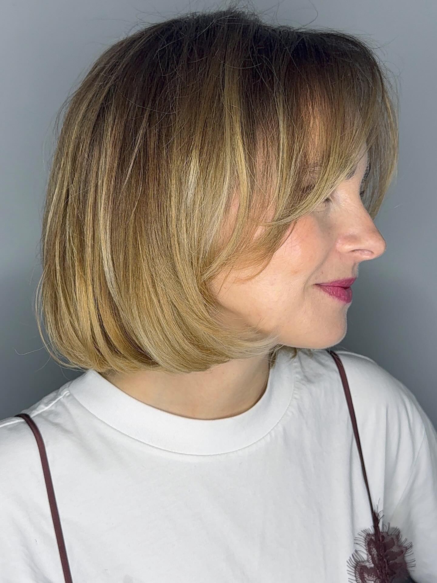 Rounded Chin-Length Bob with Soft Face-Framing Layers and Root Melt