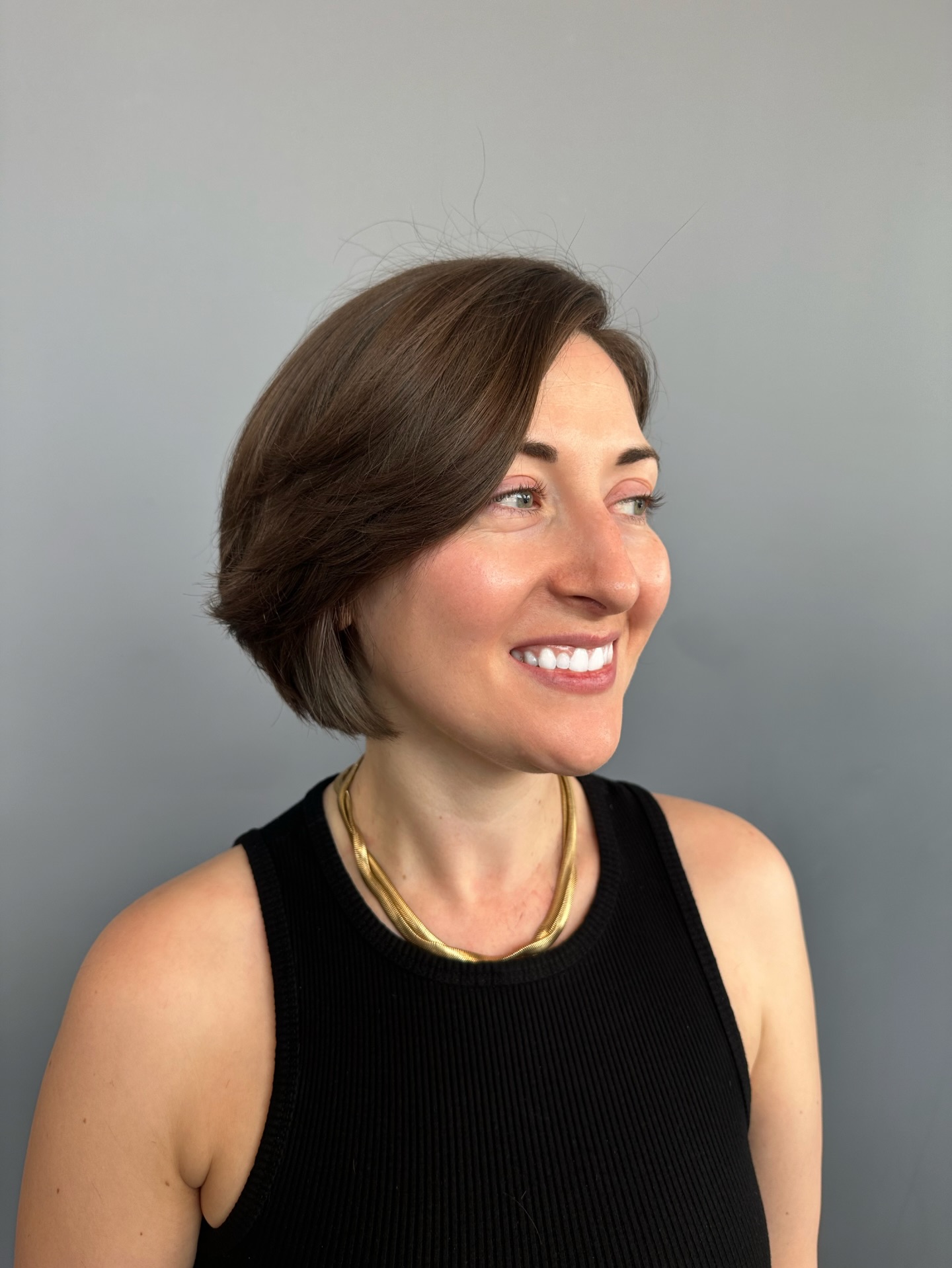 Sculpted Chin-Length Bob with Over-Directed Side Fringe
