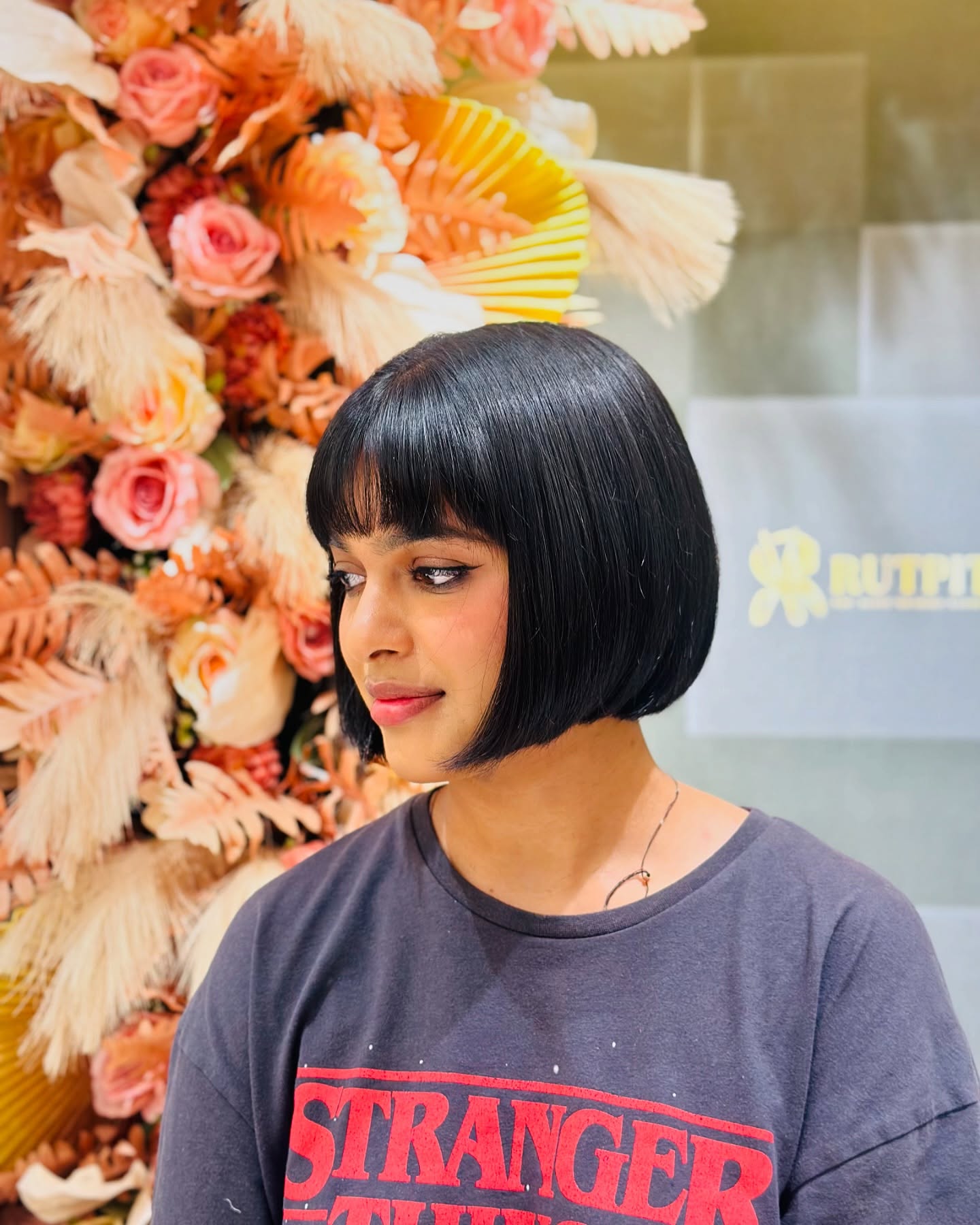 Shiny Jet-Black Chin-Length Bob with Soft Blunt Fringe