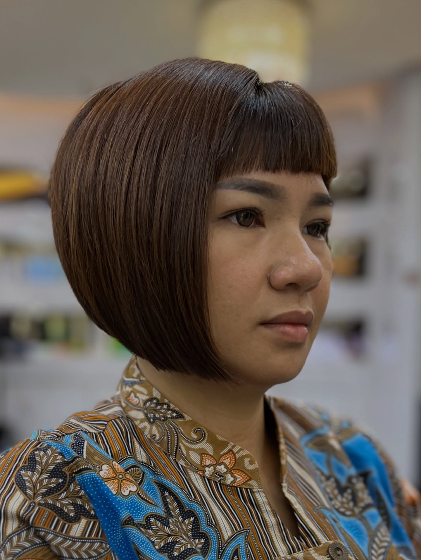 Sleek Angled Chin-Length Bob with Micro Blunt Bangs