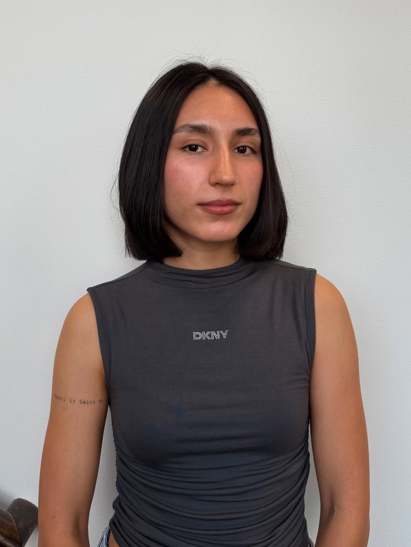 Sleek Chin-Length Blunt Bob with Subtle Internal Graduation