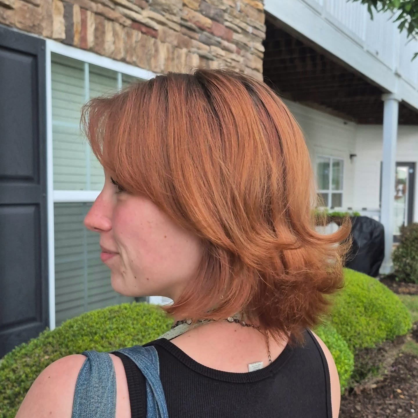 Warm Copper Chin-Length Flipped Bob with Soft Side-Swept Framing