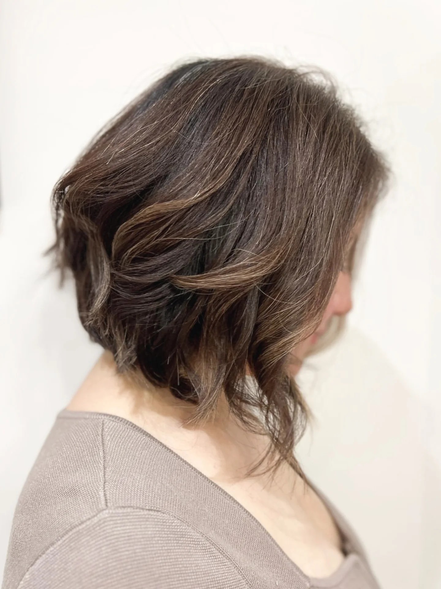 Brushed-Out Angled Bob with Wispy Pointed Ends and Subtle Babylights