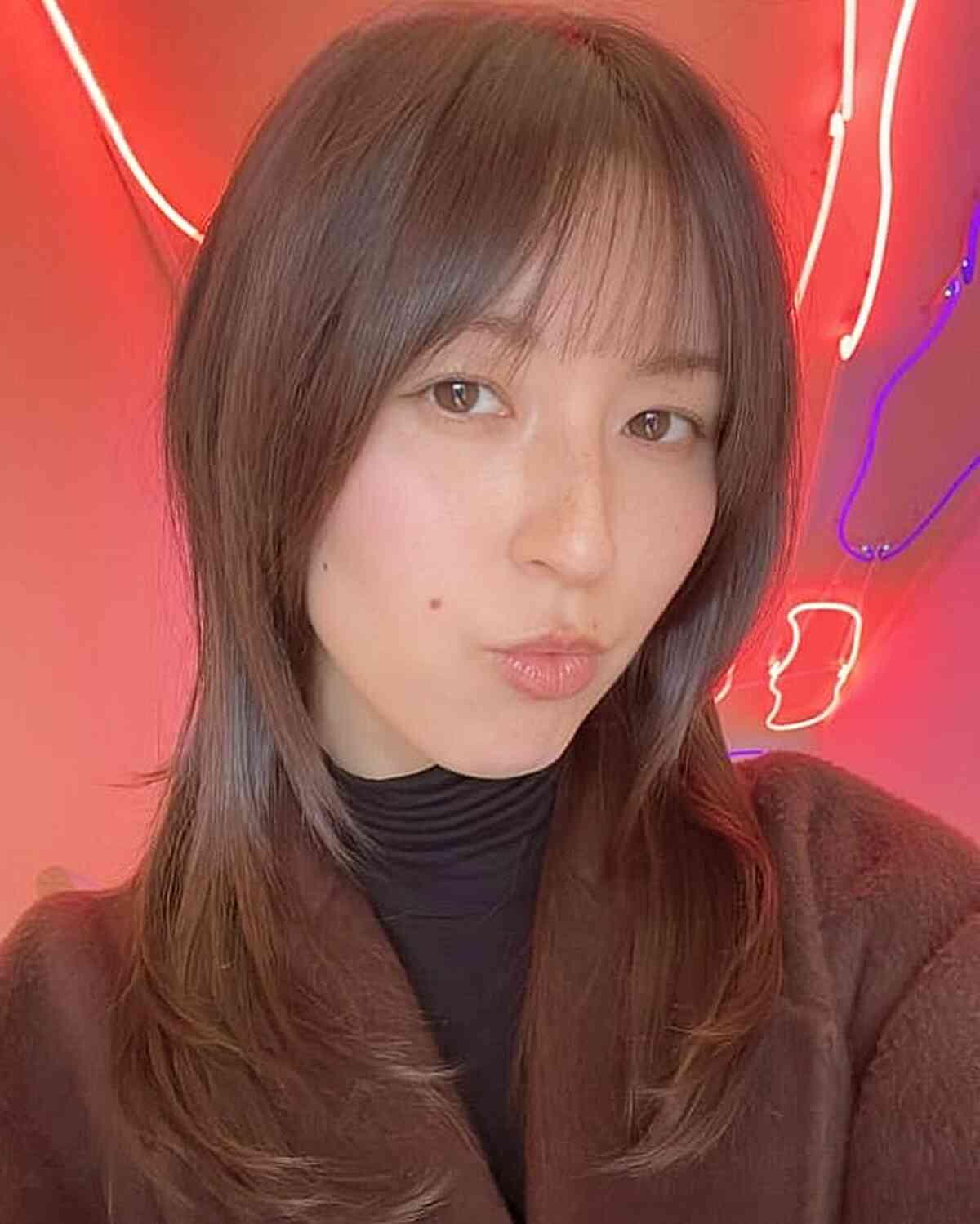 Stylish Wispy Bangs with Long Layers