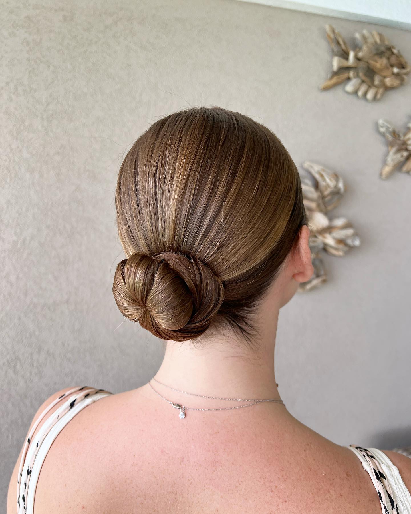 Low Wrapped Knot Bun with Subtle Root Shadow