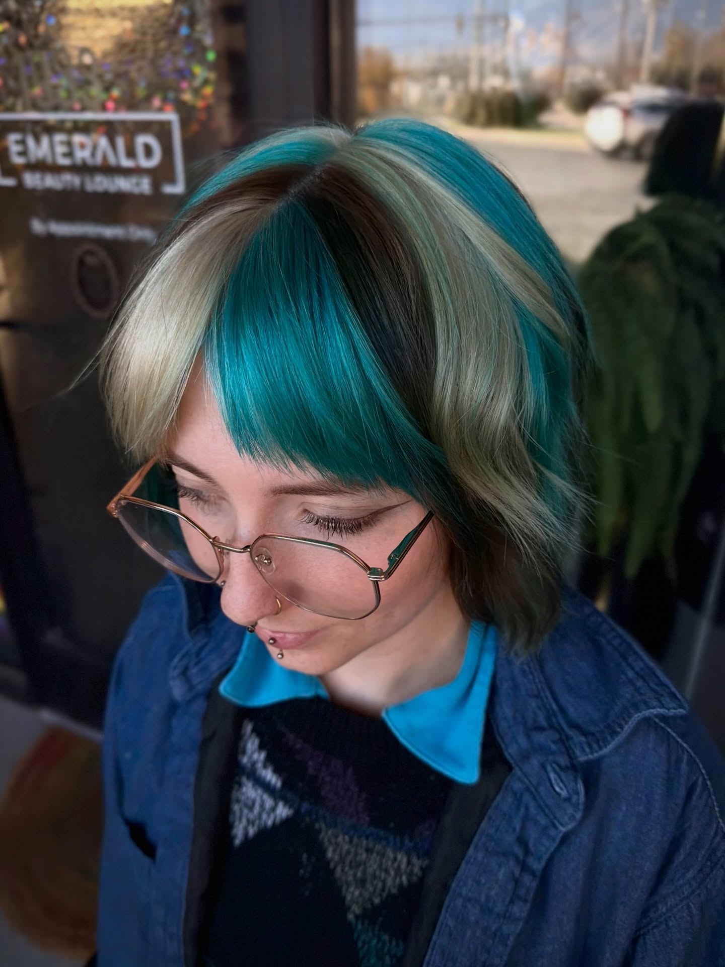 Chunky Teal Curtain-Bang Bob with Platinum Streaks